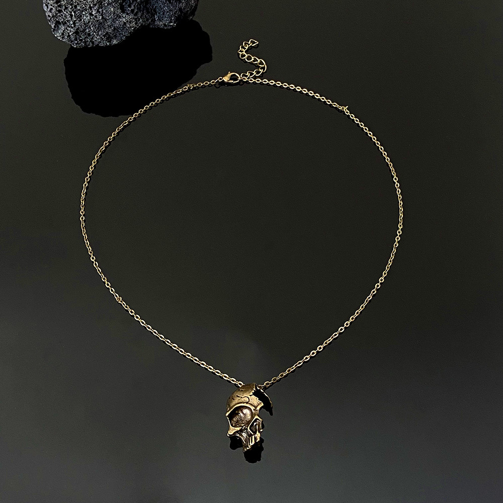 Half face skull necklace