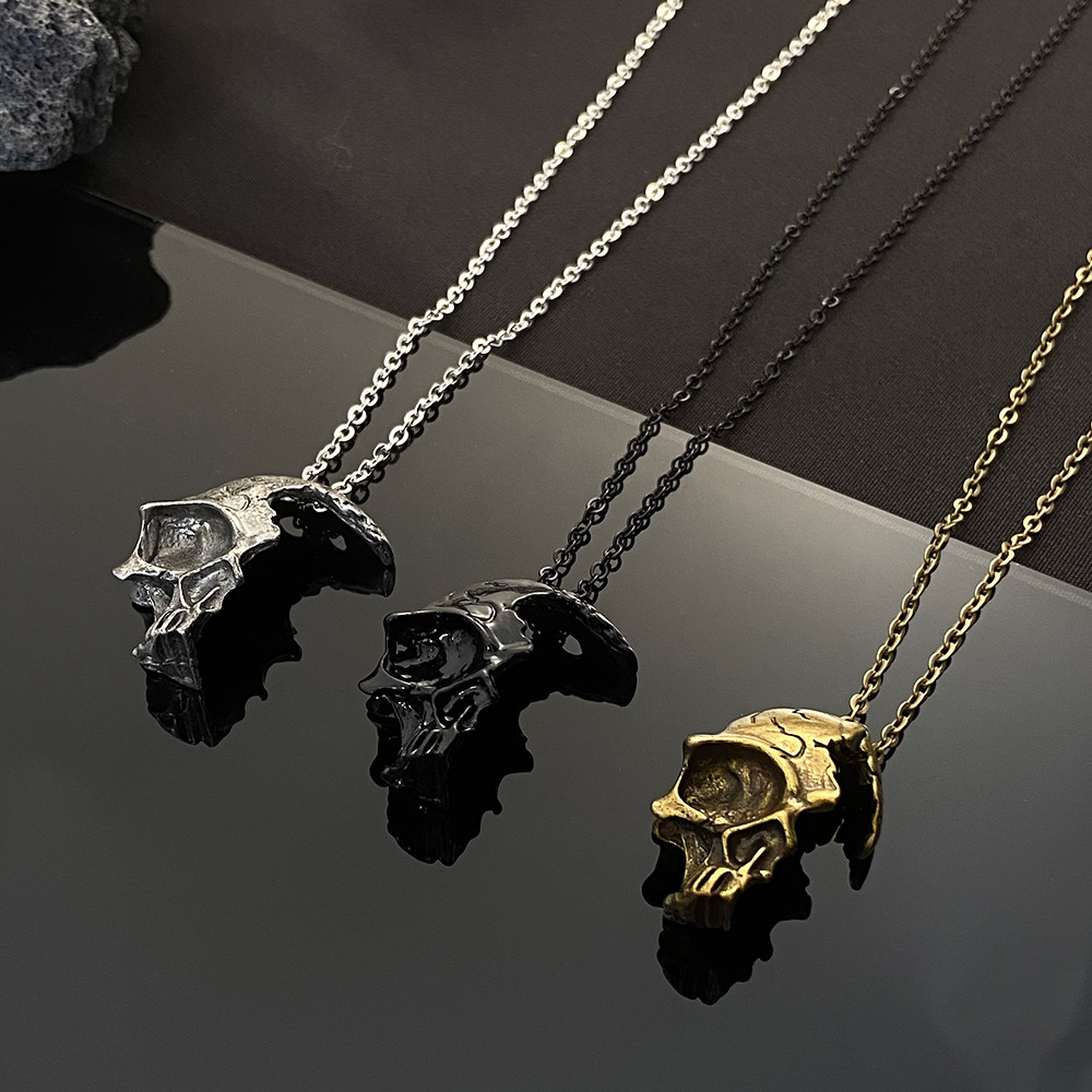 Half face skull necklace