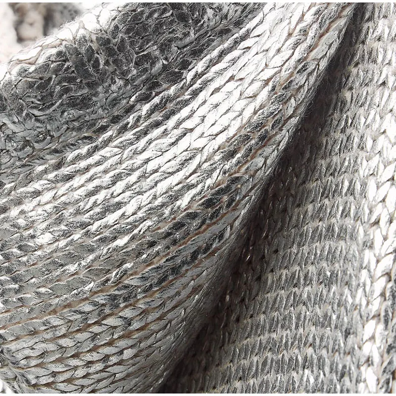 Our Women's Metallic Rib Trim Foil Hooded Sweater is the perfect addition to your autumn and winter wardrobe.