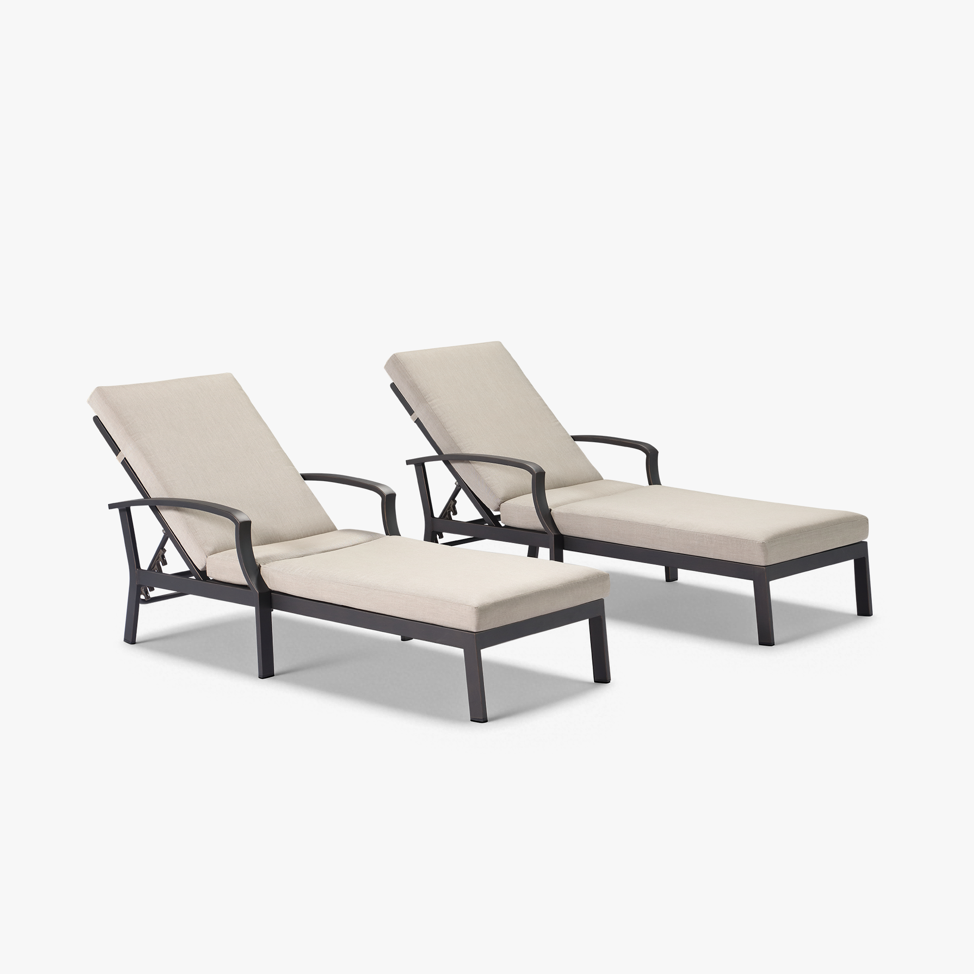 Two beige cushioned outdoor lounge chairs with adjustable backs and black frames -Seehill