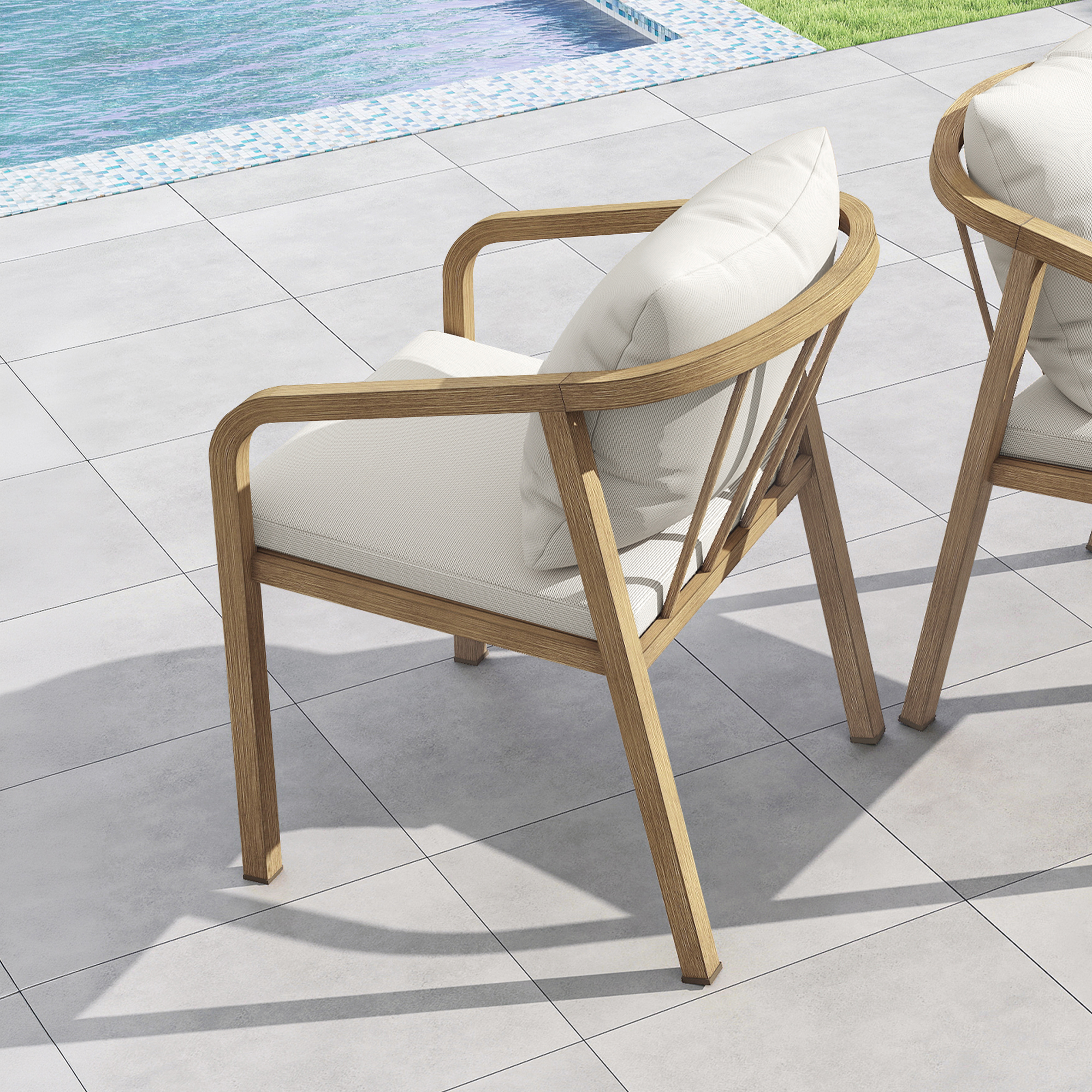 Outdoor dining chairs with wraparound wooden frames and cushioned seats by the poolside-Seehill