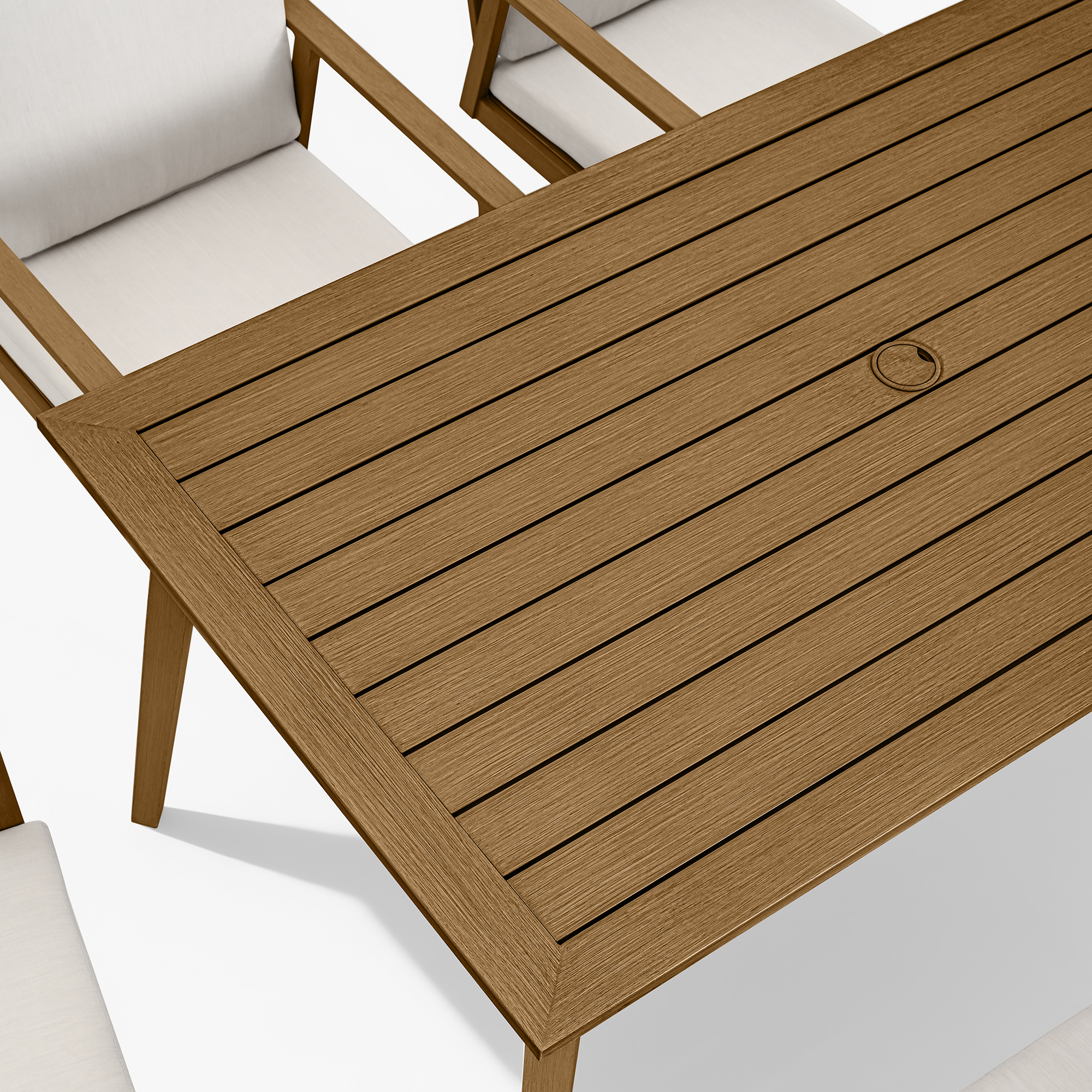 Crafted with an outdoor wooden dining table featuring a slatted design and umbrella hole for convenient use. - Seehill
