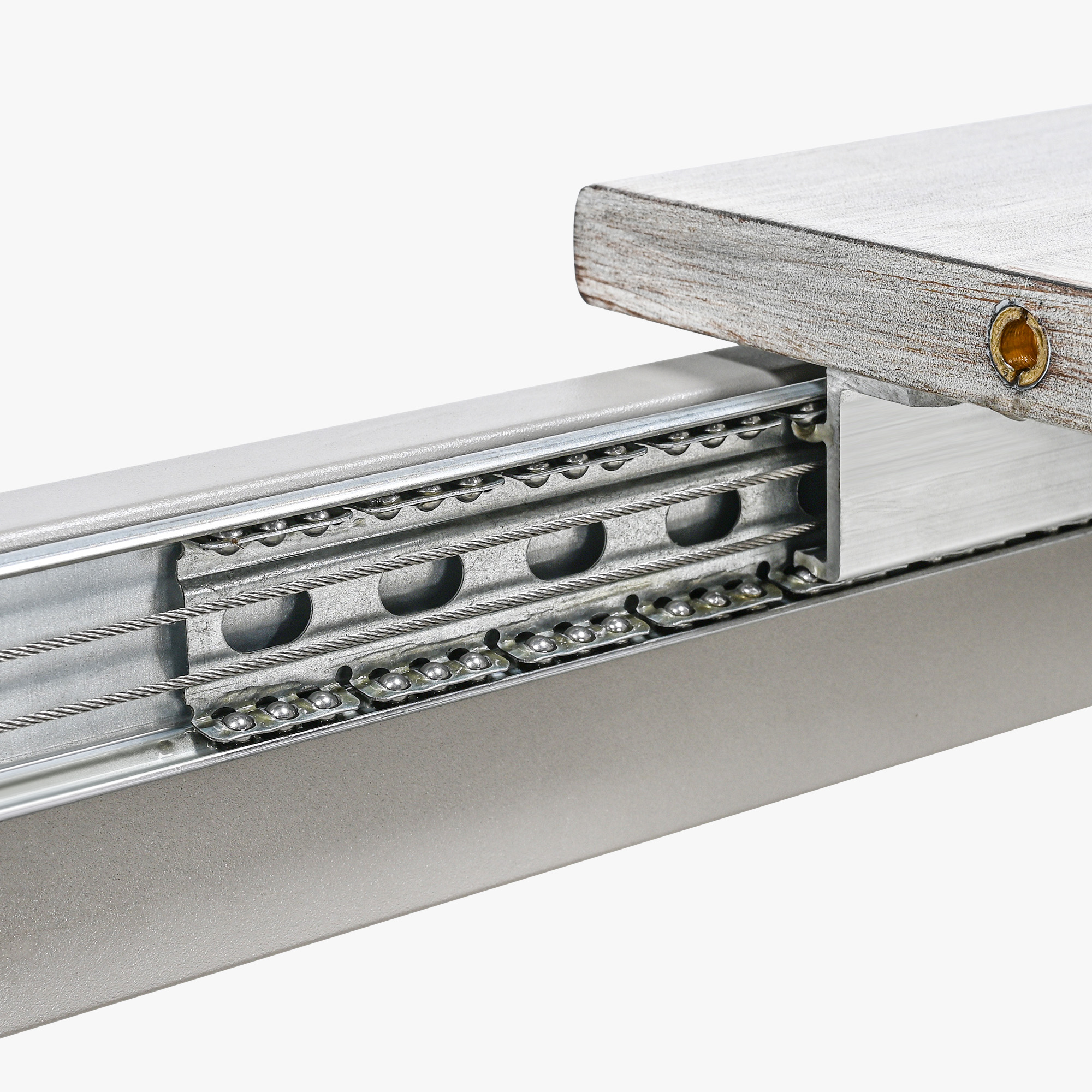Close-up of the metal U-shaped sliding mechanism and wood tabletop edge on an expandable pat-Seehill