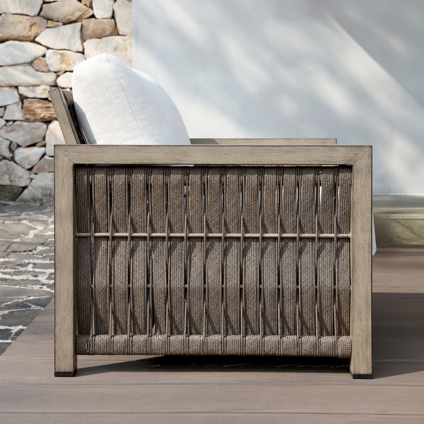 Outdoor armchair with woven rope backrest, weather-resistant frame - Seehill