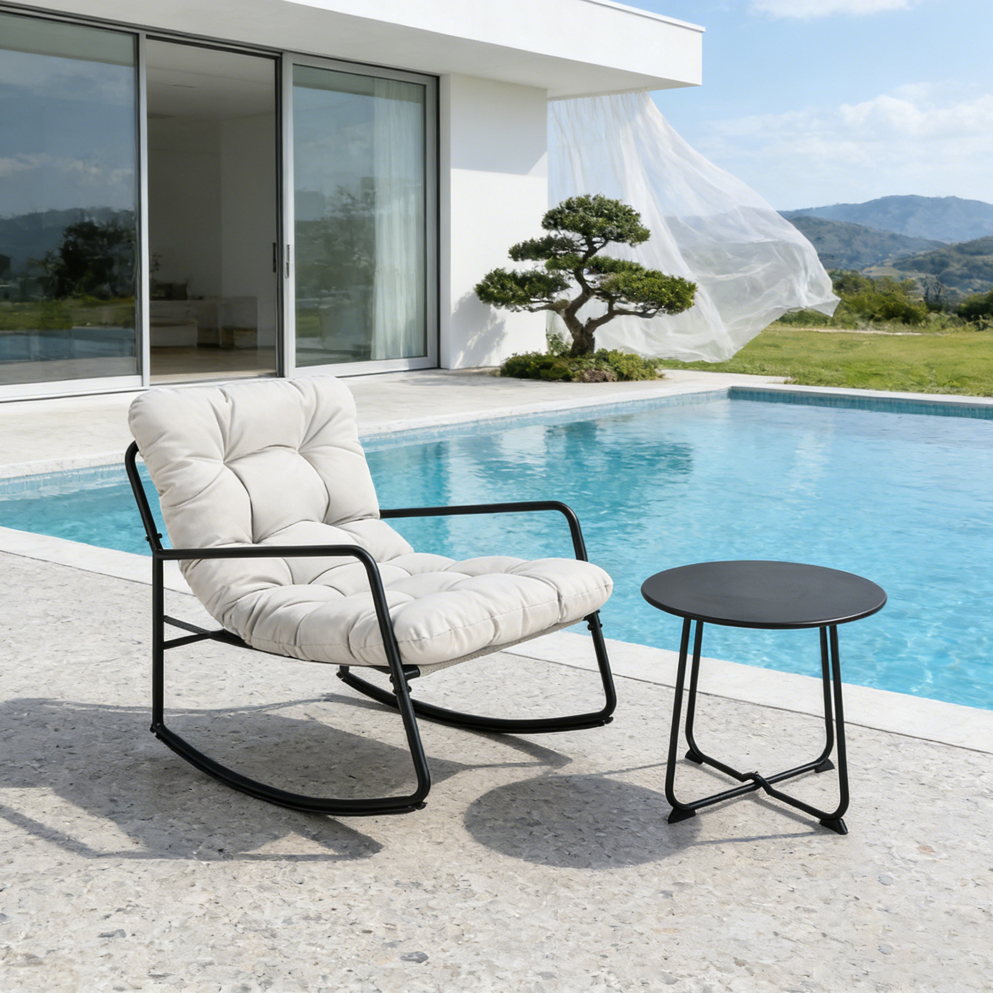 Modern metal patio rocking chair with cushioned seat and back by poolside with table -Seehill