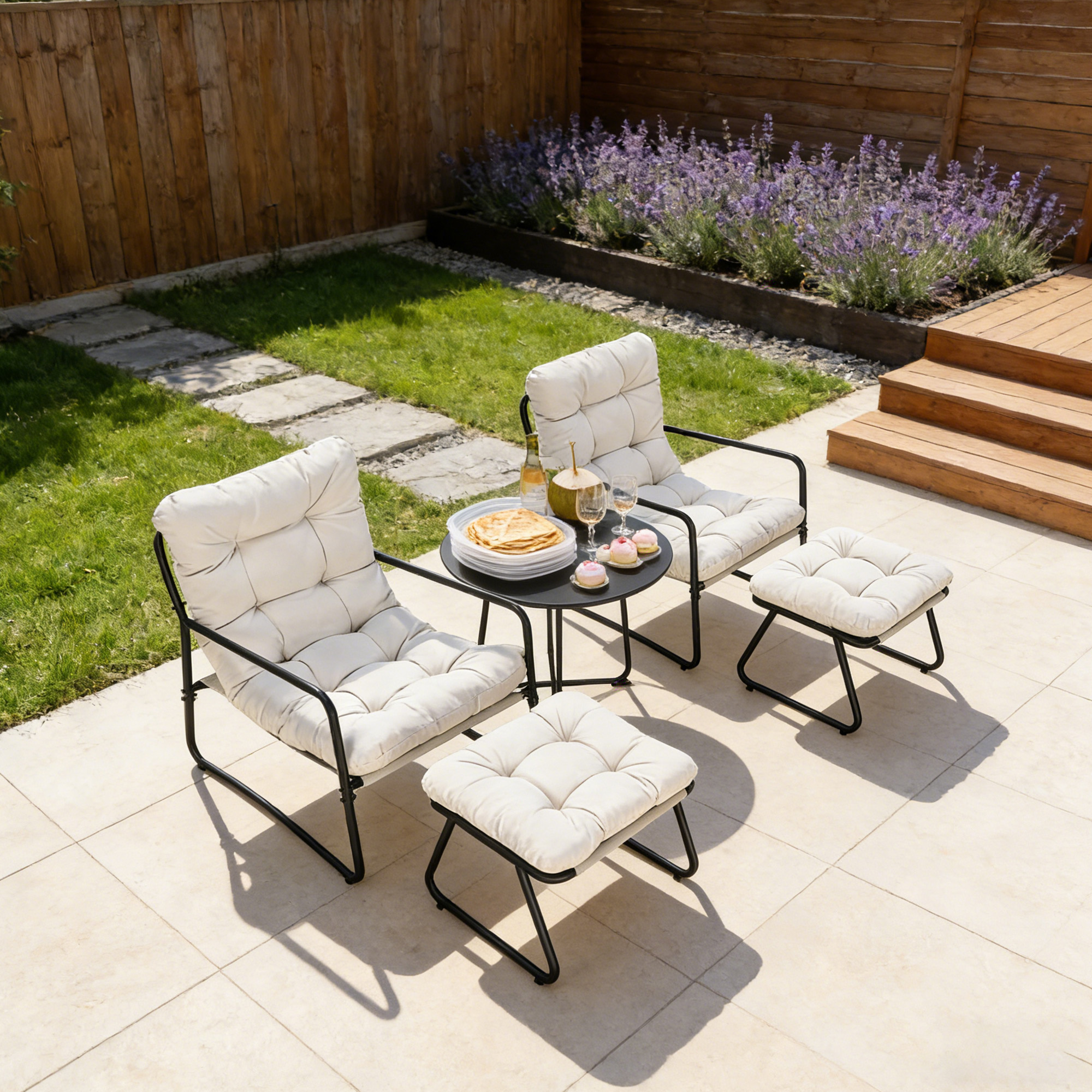 Modern metal patio rocking chairs with cushioned seats and matching ottomans on a sunny pati-Seehill