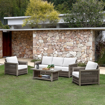 Outdoor wicker patio set with white cushions, coffee table, and modern - Seehill