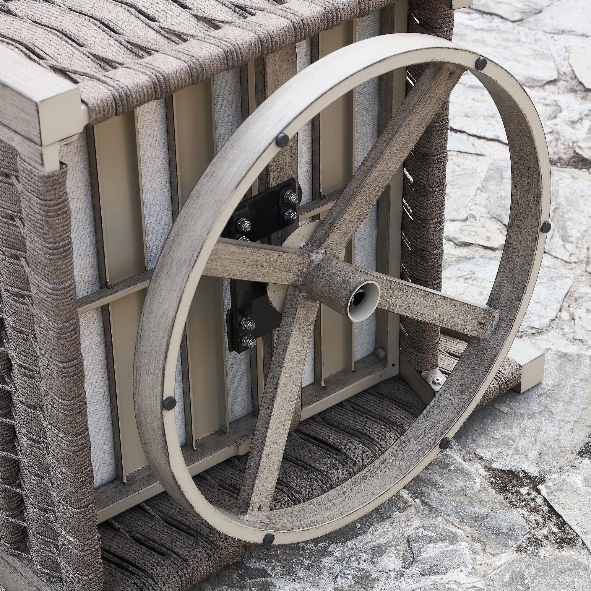 Explore the rattan outdoor cart with wooden wheels and metal frame as part of the graceful oversize rope weave furniture collection. - Seehill