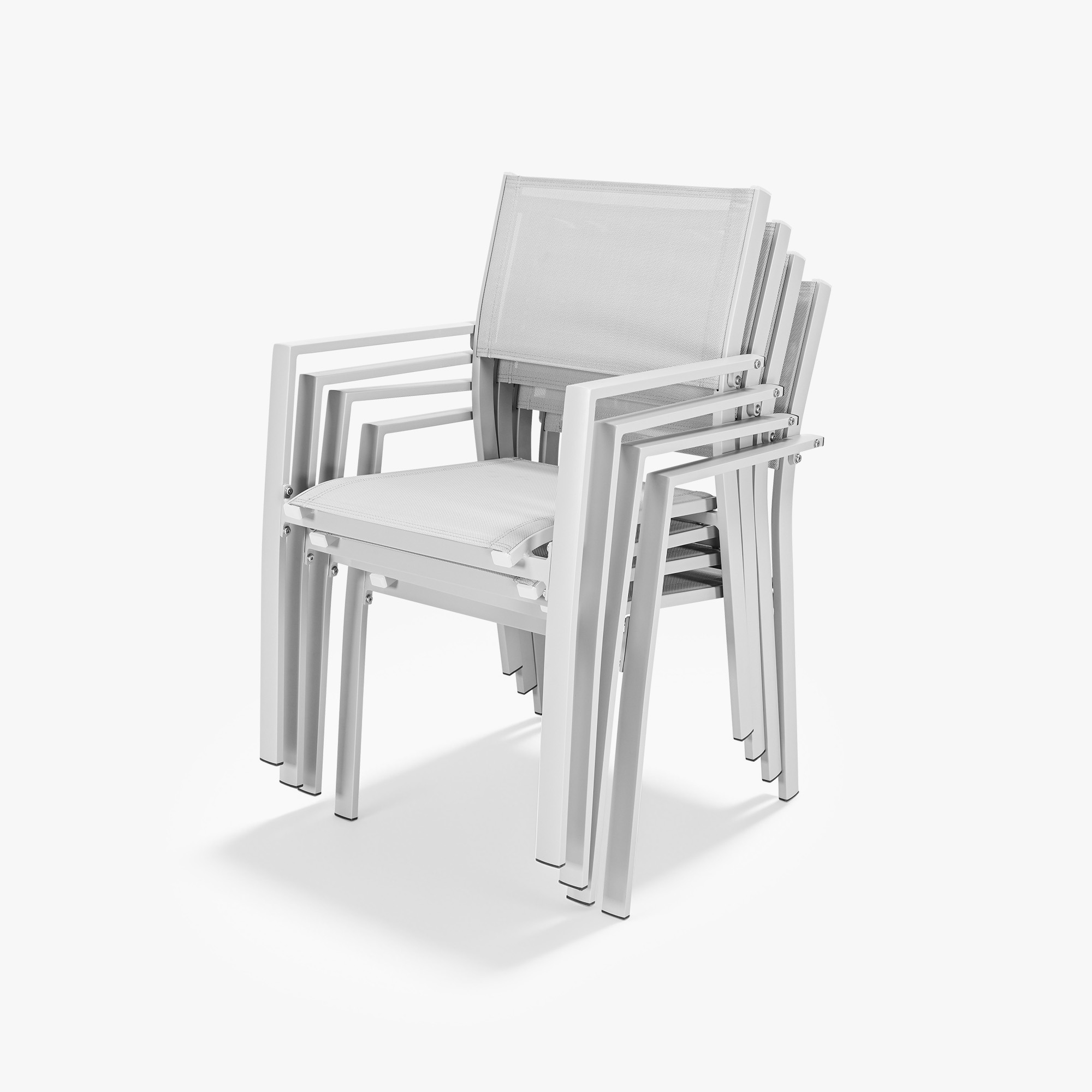 Stackable patio dining chairs with white textile seats and armrests on white background -Seehill