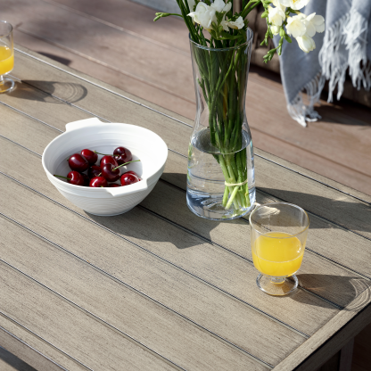 White ceramic bowl with dual handles holding fresh - Seehill