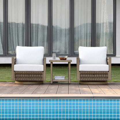Outdoor wicker chairs with white cushions by poolside - Seehill