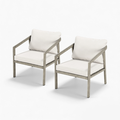 A sophisticated piece Patio Outdoor Armchair Set featuring two beige cushioned armchairs with dark frames. - Seehill