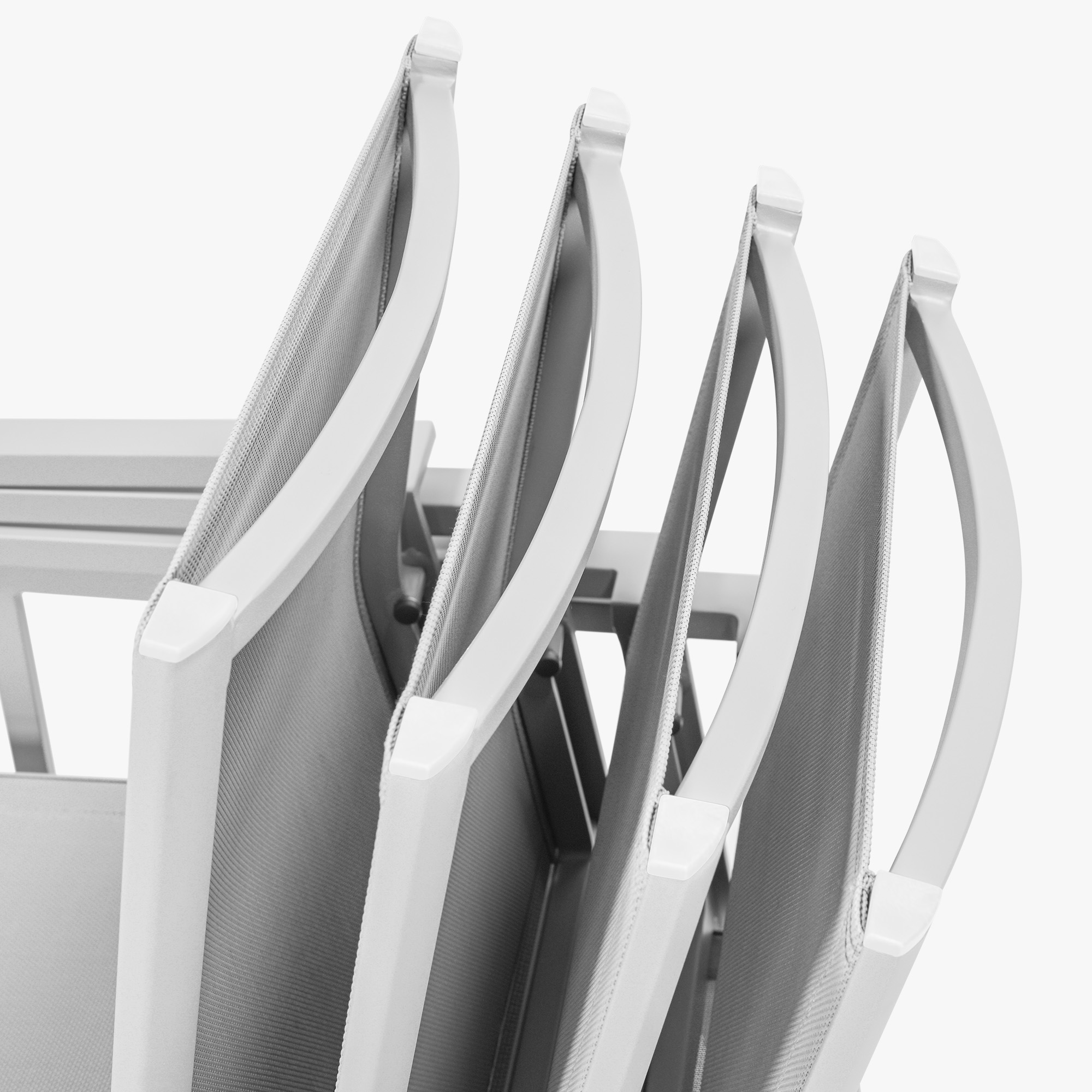 Close-up of gray fabric and metal frame on outdoor dining chairs with curved backs -Seehill