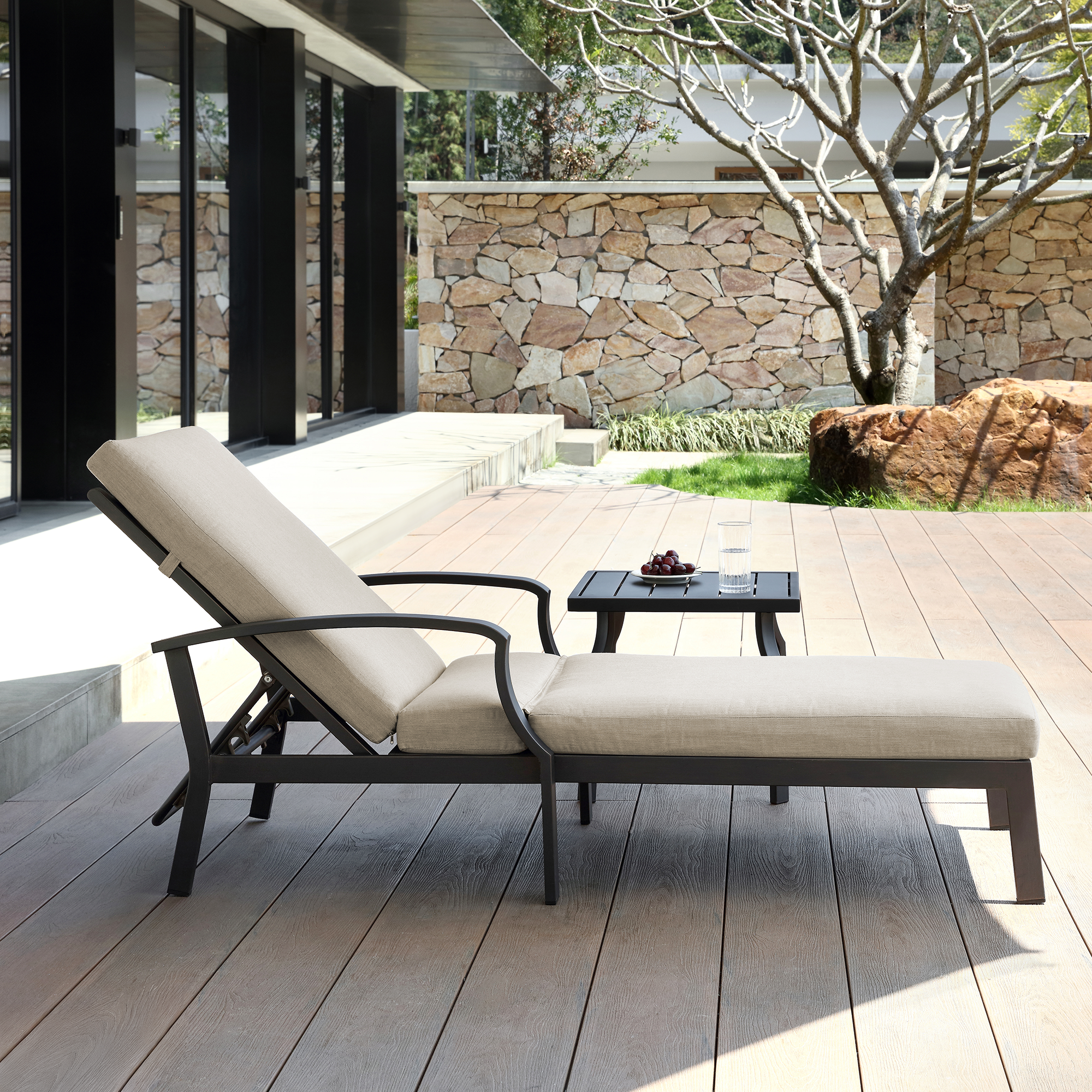 Outdoor patio lounge chair with adjustable backrest and side table on wooden deck-Seehill