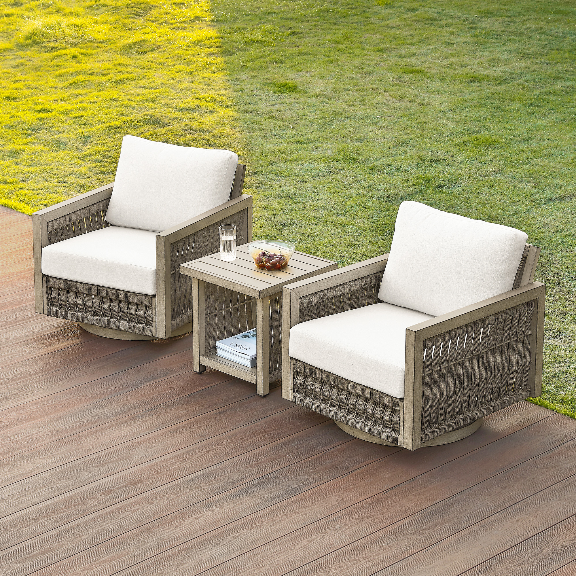Crafted with an outdoor patio set featuring two swivel chairs with white cushions and a wooden frame, this outdoor space offers comfort and style. - Seehill