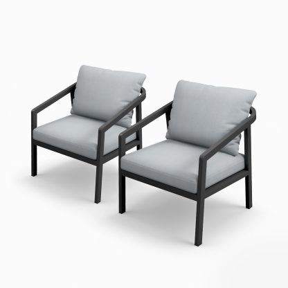 Crafted with two beige cushioned armchairs with black metal frames arranged on a patio for comfort and style. - Seehill