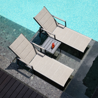 Beige outdoor lounge chairs with side table by pool - Seehill