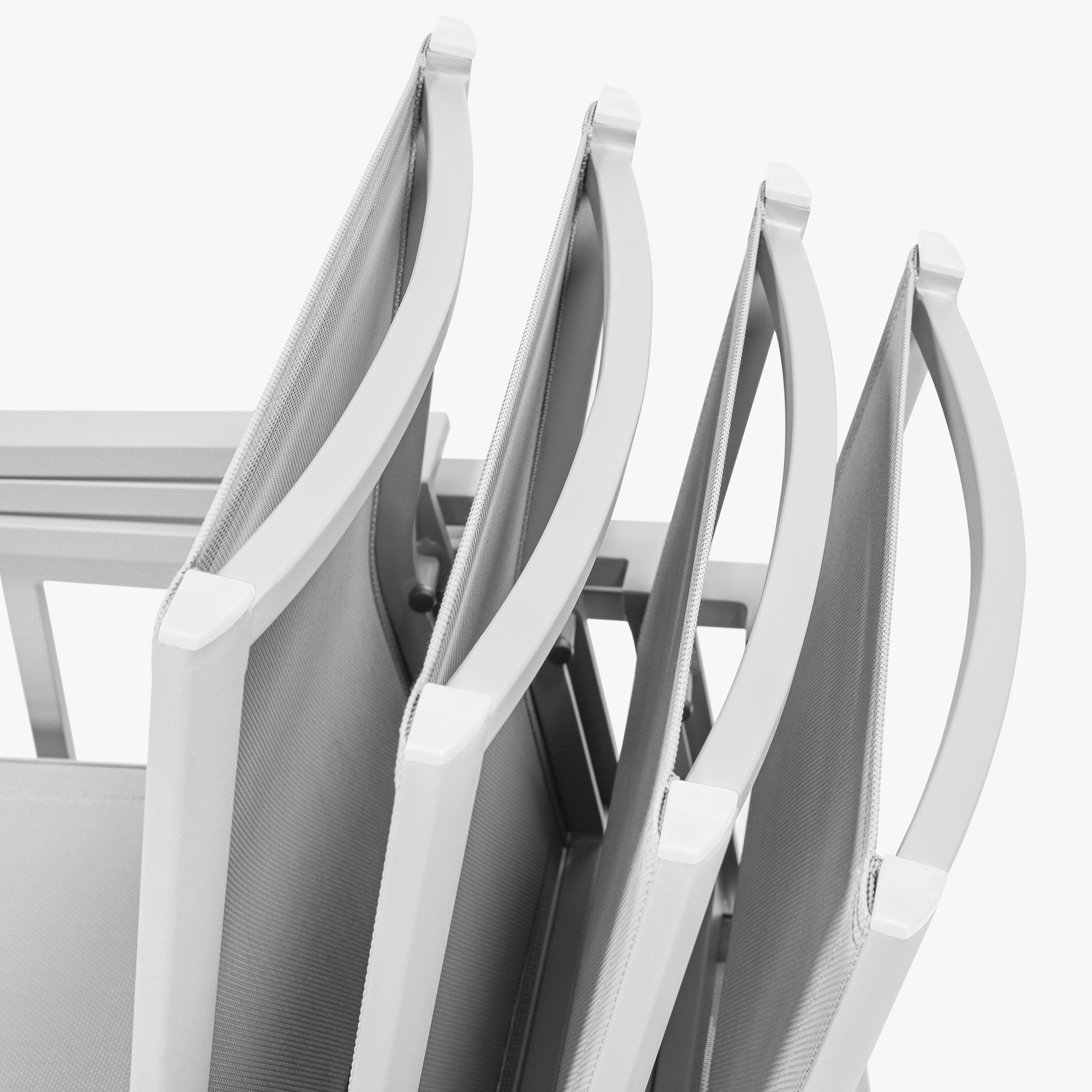 Close-up of stackable patio dining chairs with full white frames and mesh backs -Seehill