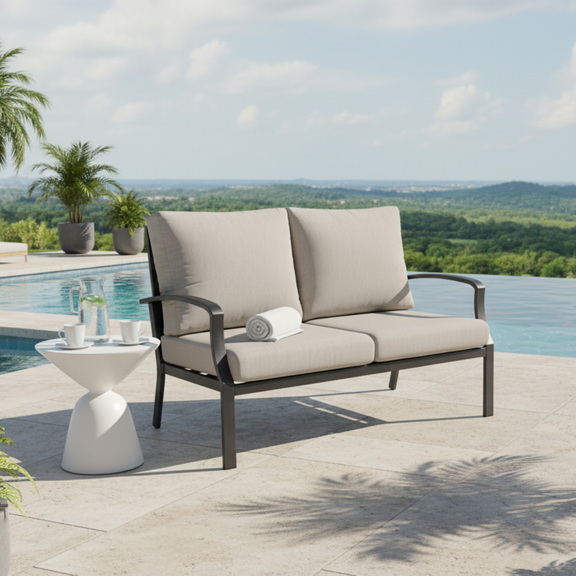 Outdoor loveseat sofa with beige cushions by the poolside overlooking a scenic green landsca-Seehill