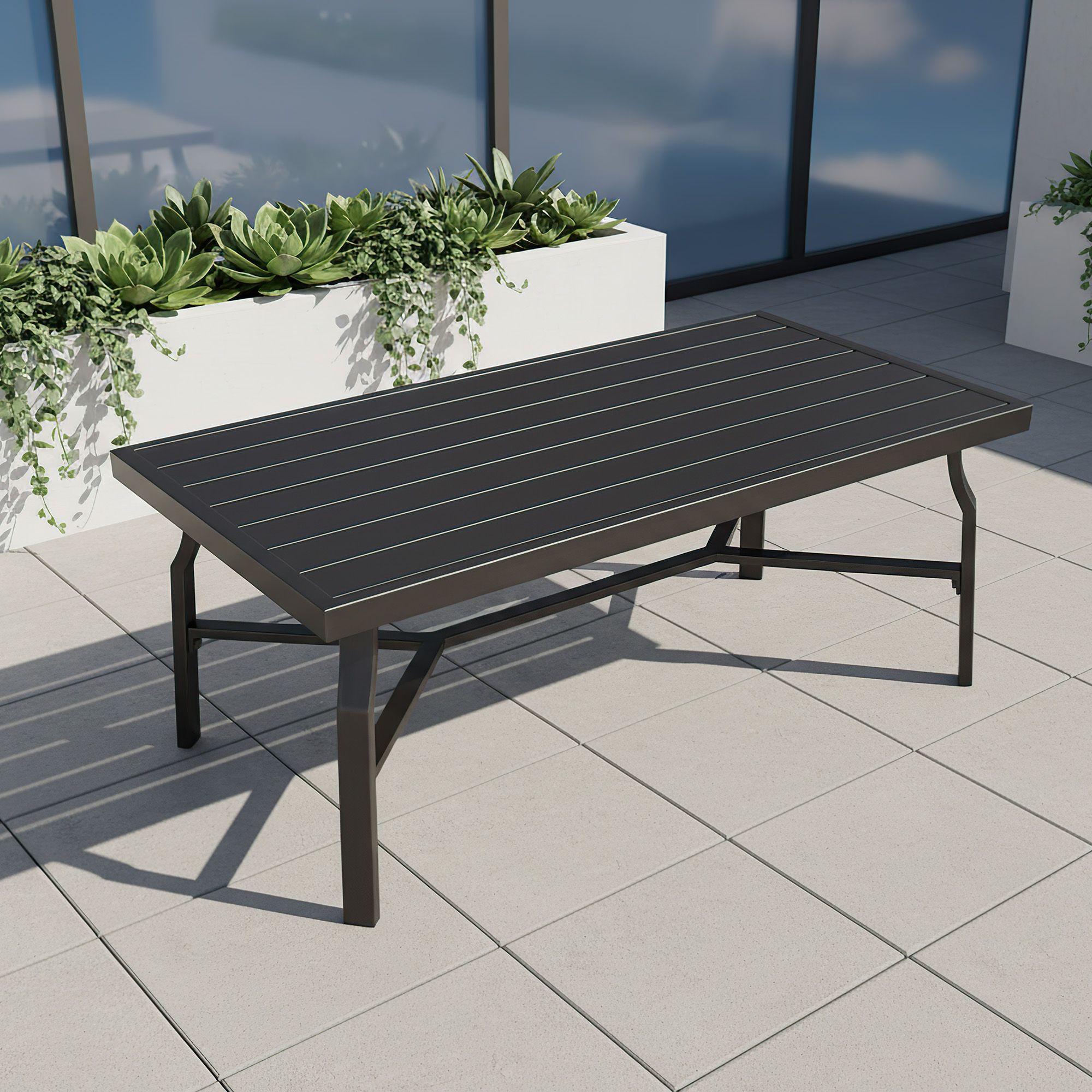 Outdoor patio setting with a rectangular slatted coffee table on tiled flooring -Seehill