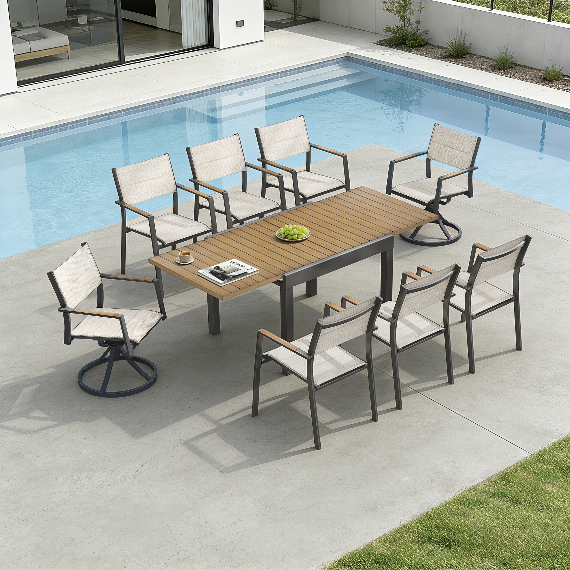 Extendable outdoor dining set with swivel chairs arranged by a pool on patio-Seehill