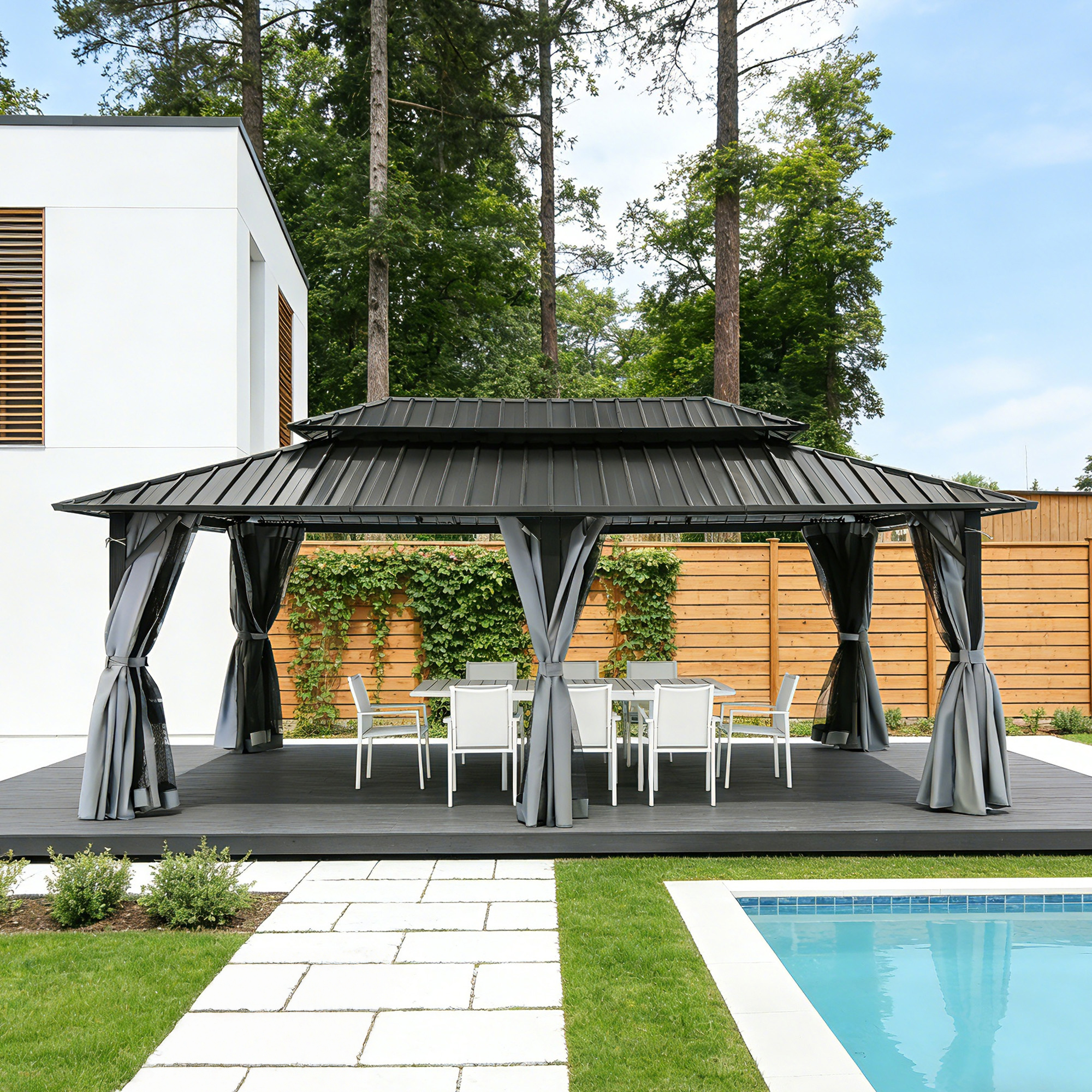 Outdoor patio hardtop gazebo with curtains set on a deck near a pool and modern house -Seehill