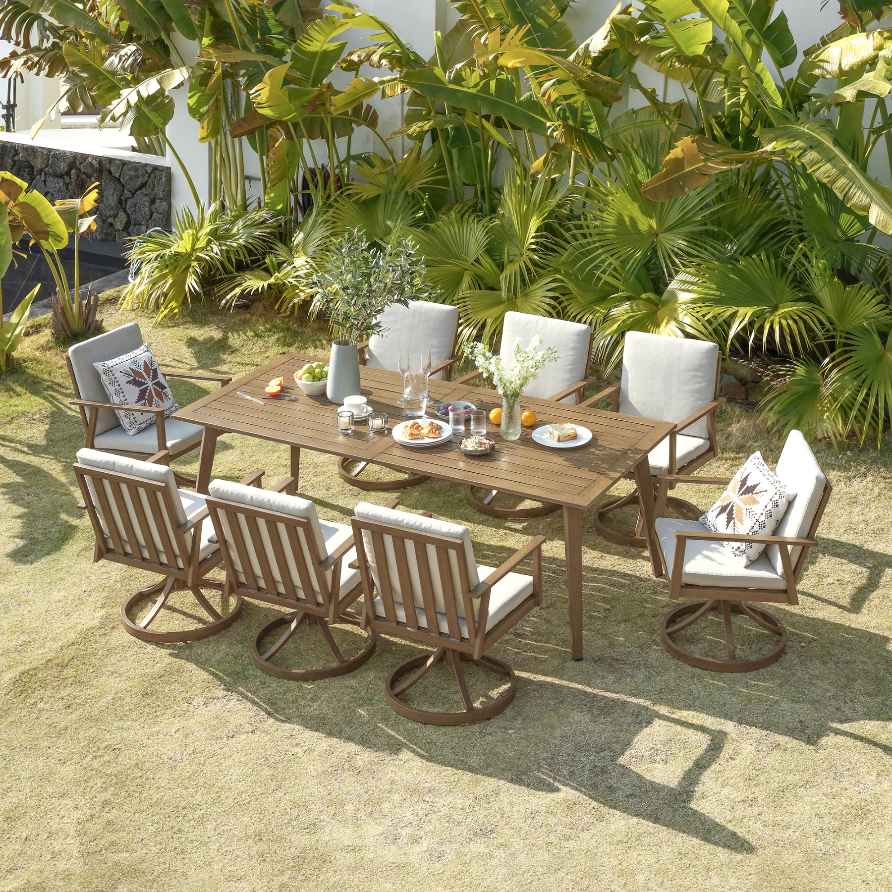 Outdoor wooden dining set with 8 cushioned chairs and table - Seehill