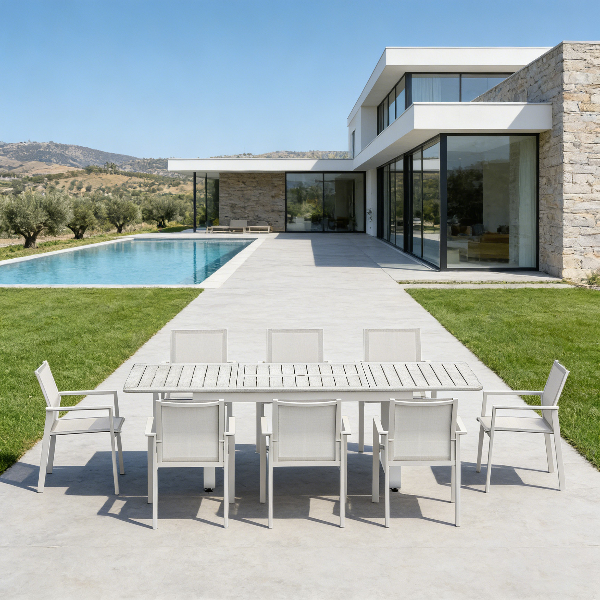 Outdoor extendable patio dining set with eight chairs by a modern poolside home -Seehill