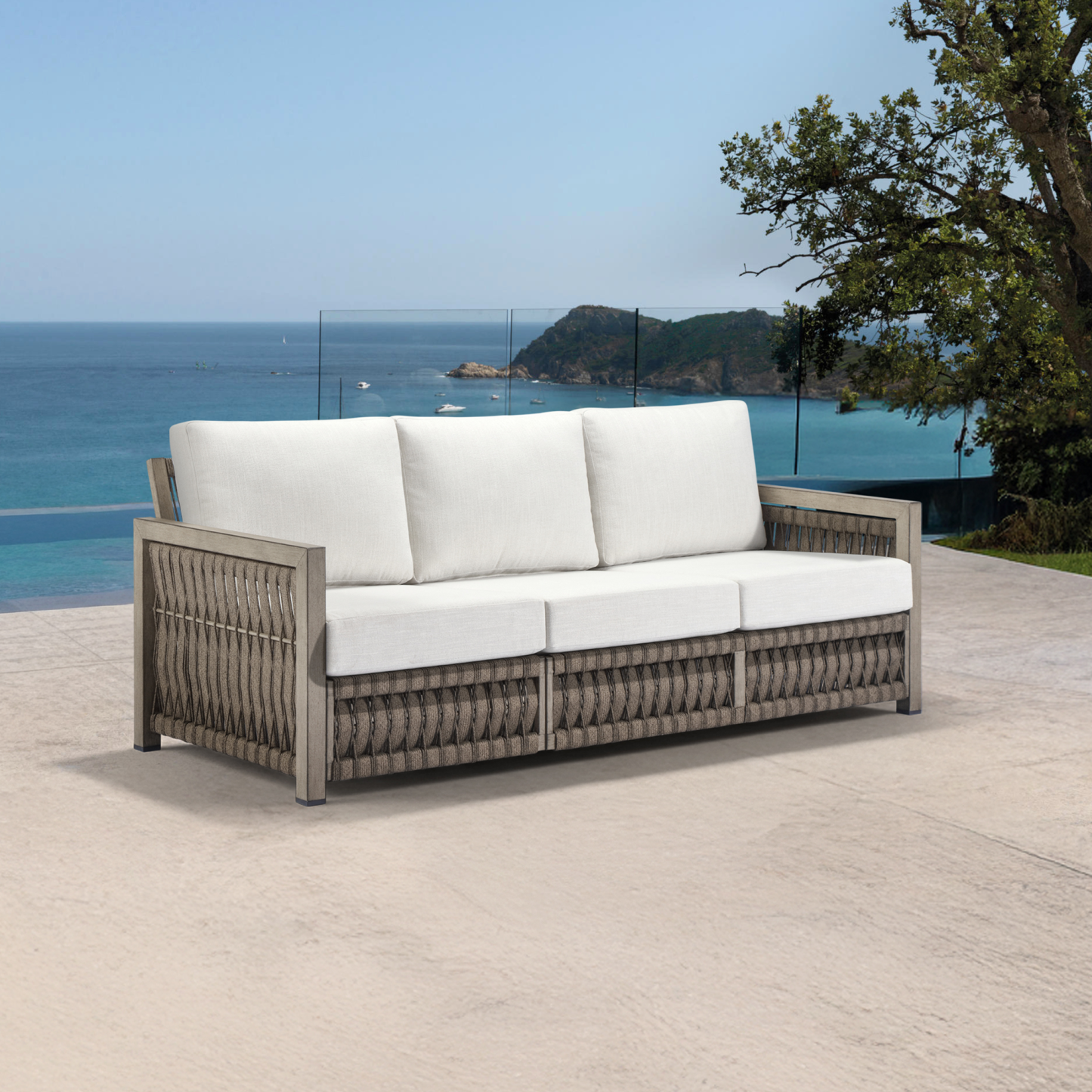 Outdoor wicker sofa with white cushions, coastal patio furniture - Seehill