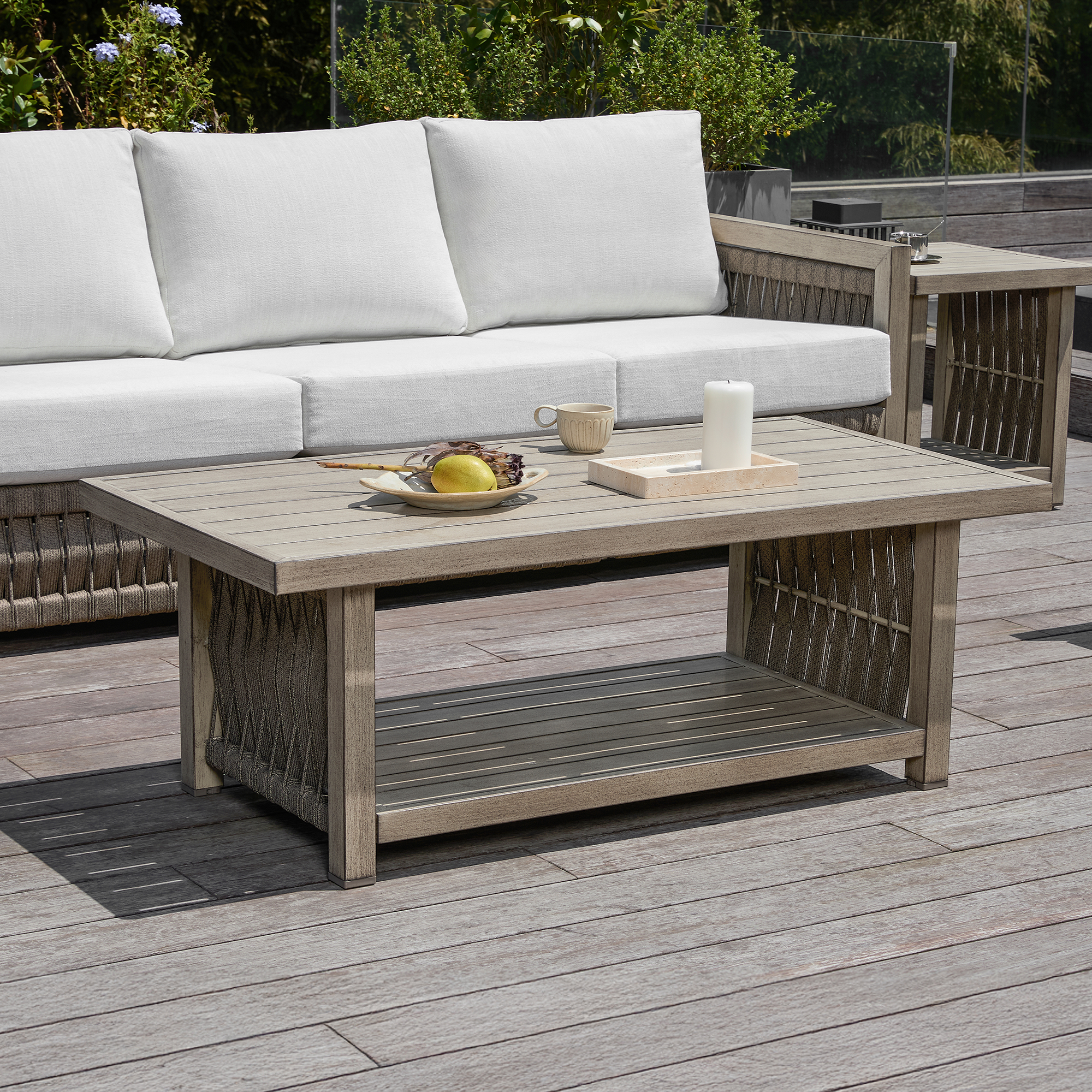 Crafted with an outdoor wooden coffee table featuring a storage shelf and woven accents, this outdoor patio set combines style and function. - Seehill