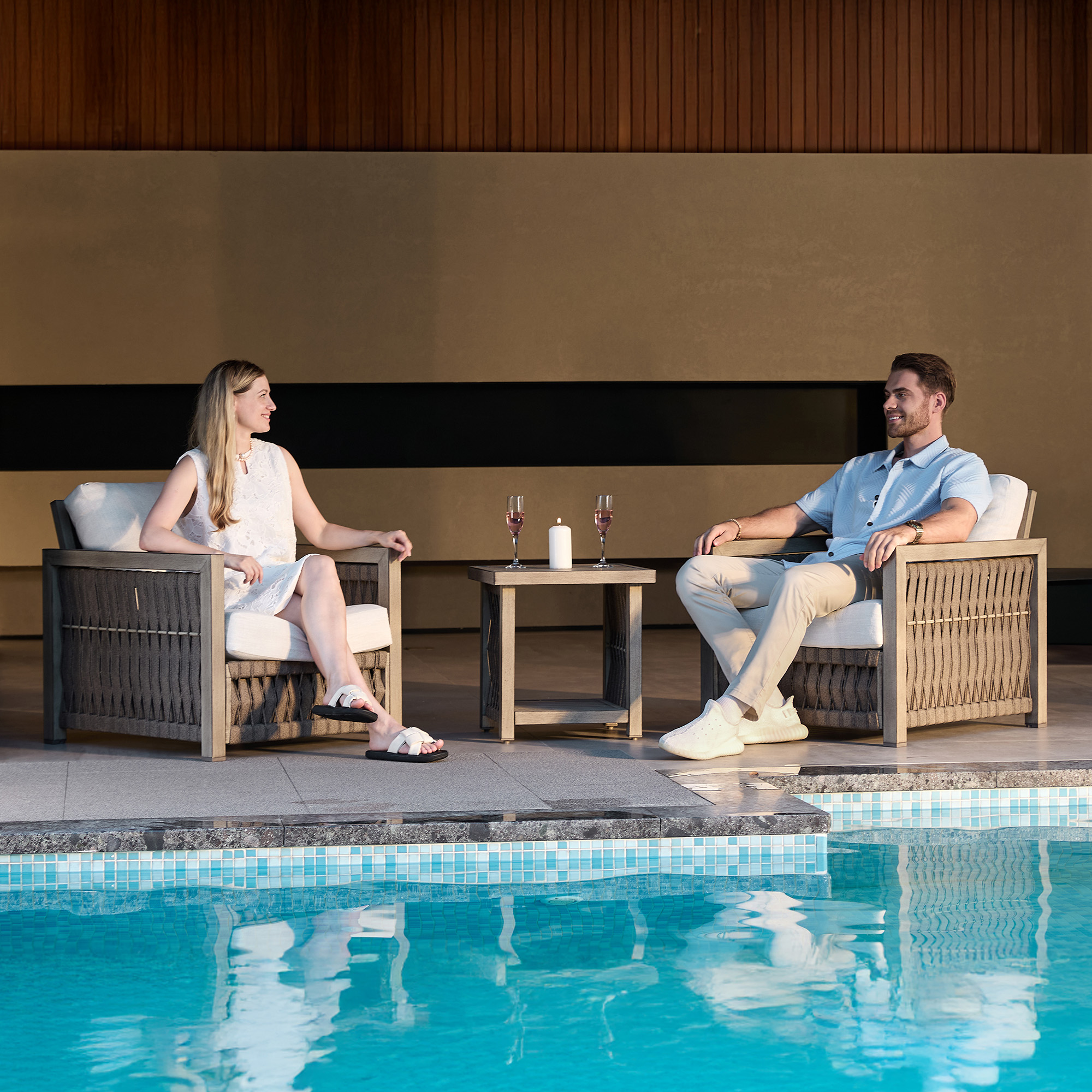 Crafted with outdoor wicker armchairs with cushions, this poolside seating set is part of the elegant Outdoor Patio collection. - Seehill