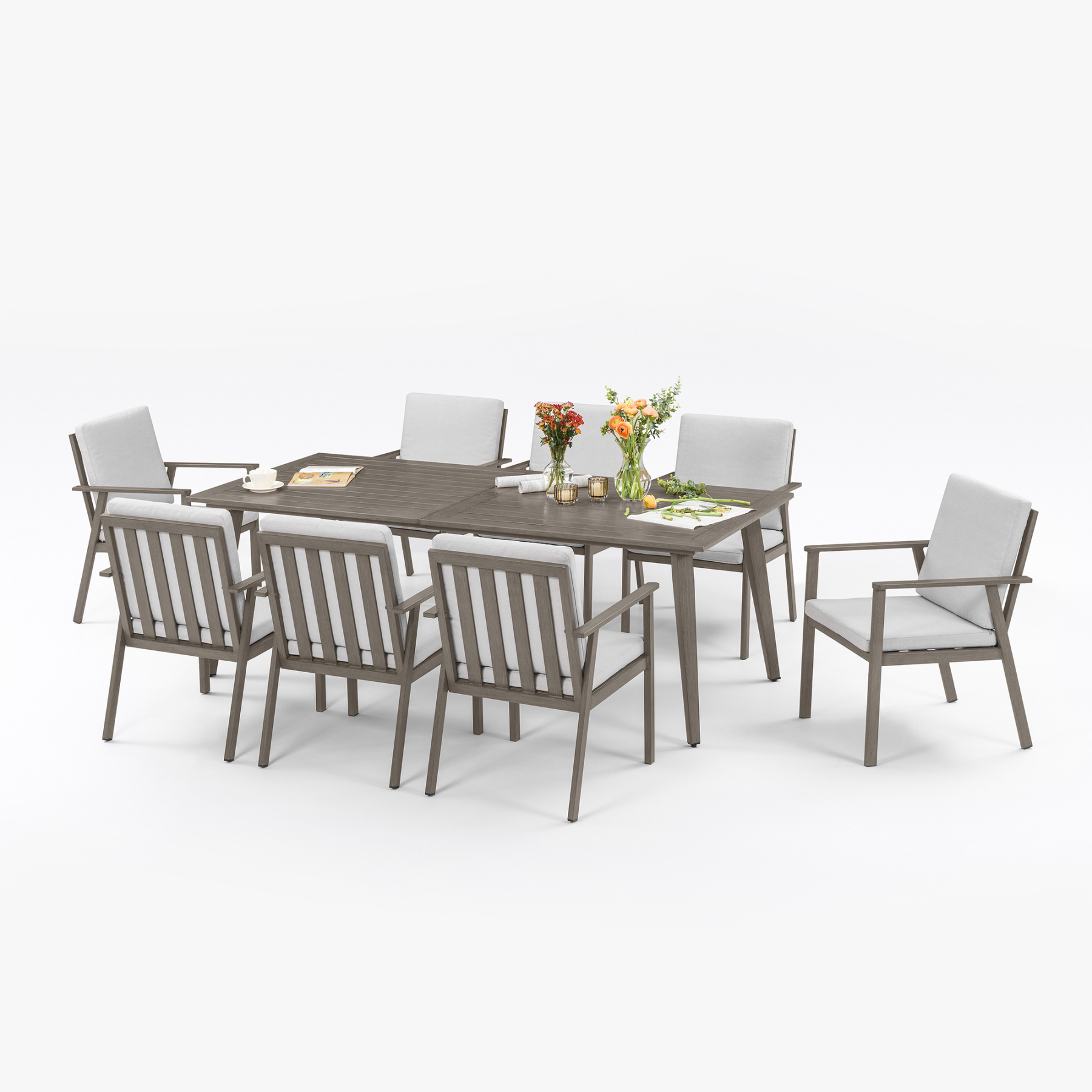 Modern outdoor dining set with gray wood finish and white cushions - Seehill