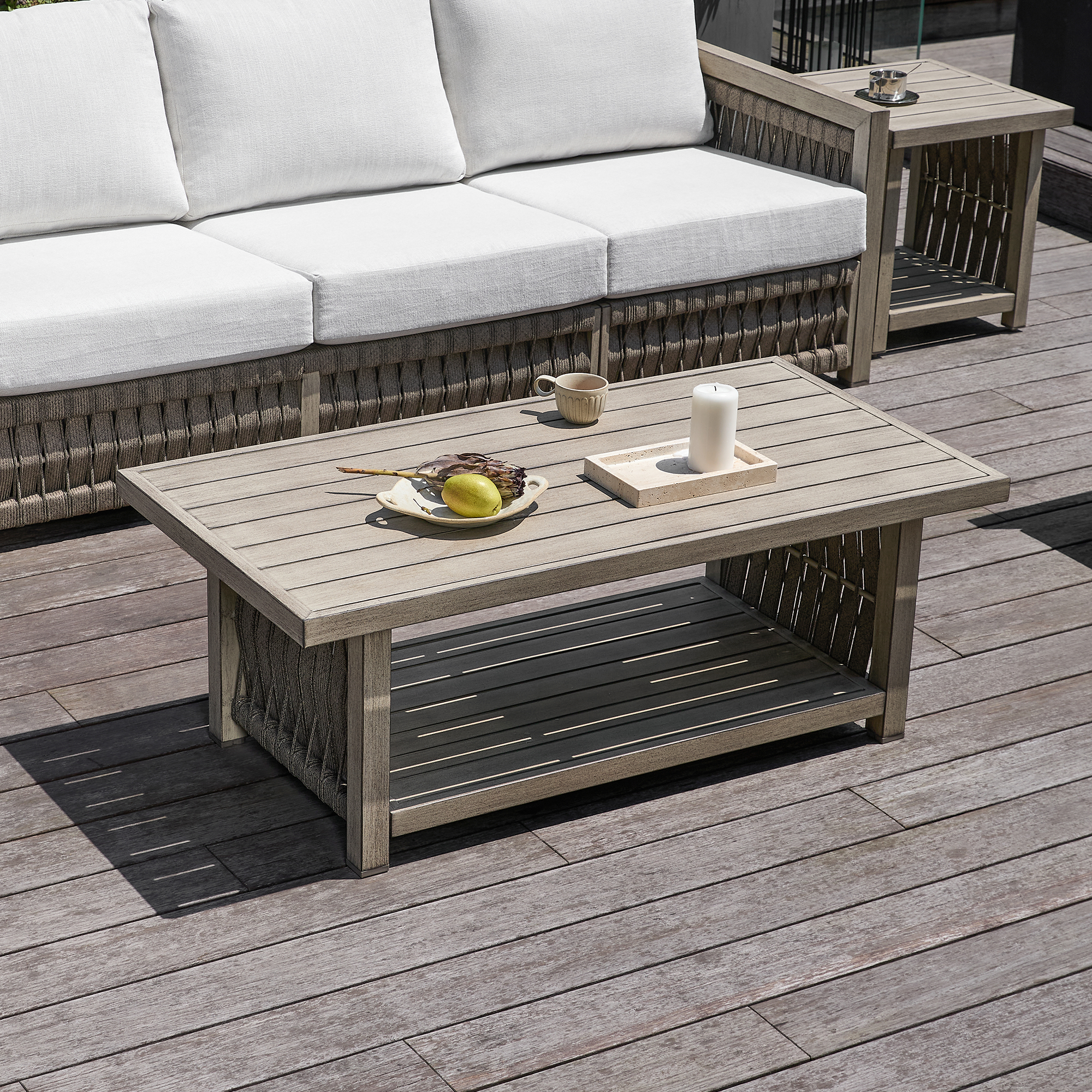 Experience the outdoor wooden coffee table with storage shelf and woven design in our opulent patio furniture collection. - Seehill