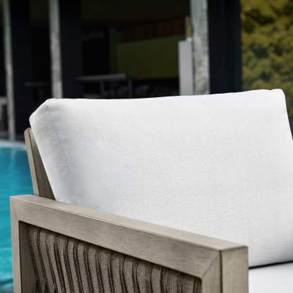 Modern outdoor armchair with textured gray woven back - Seehill