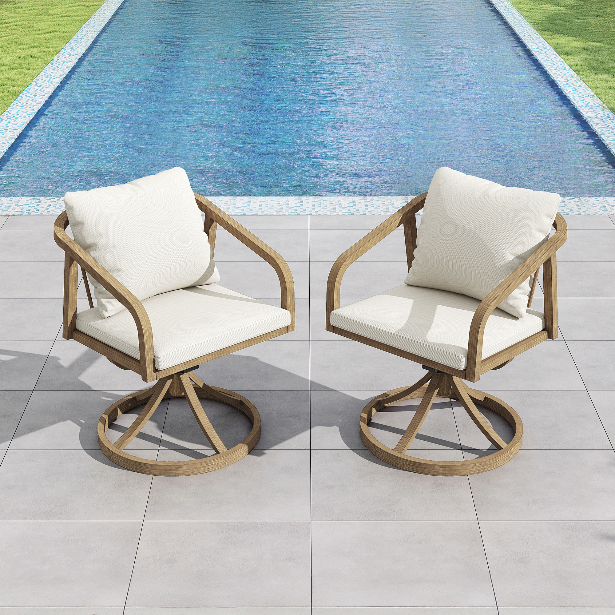Two outdoor swivel chairs with white cushions set on a tiled patio beside a pool -Seehill