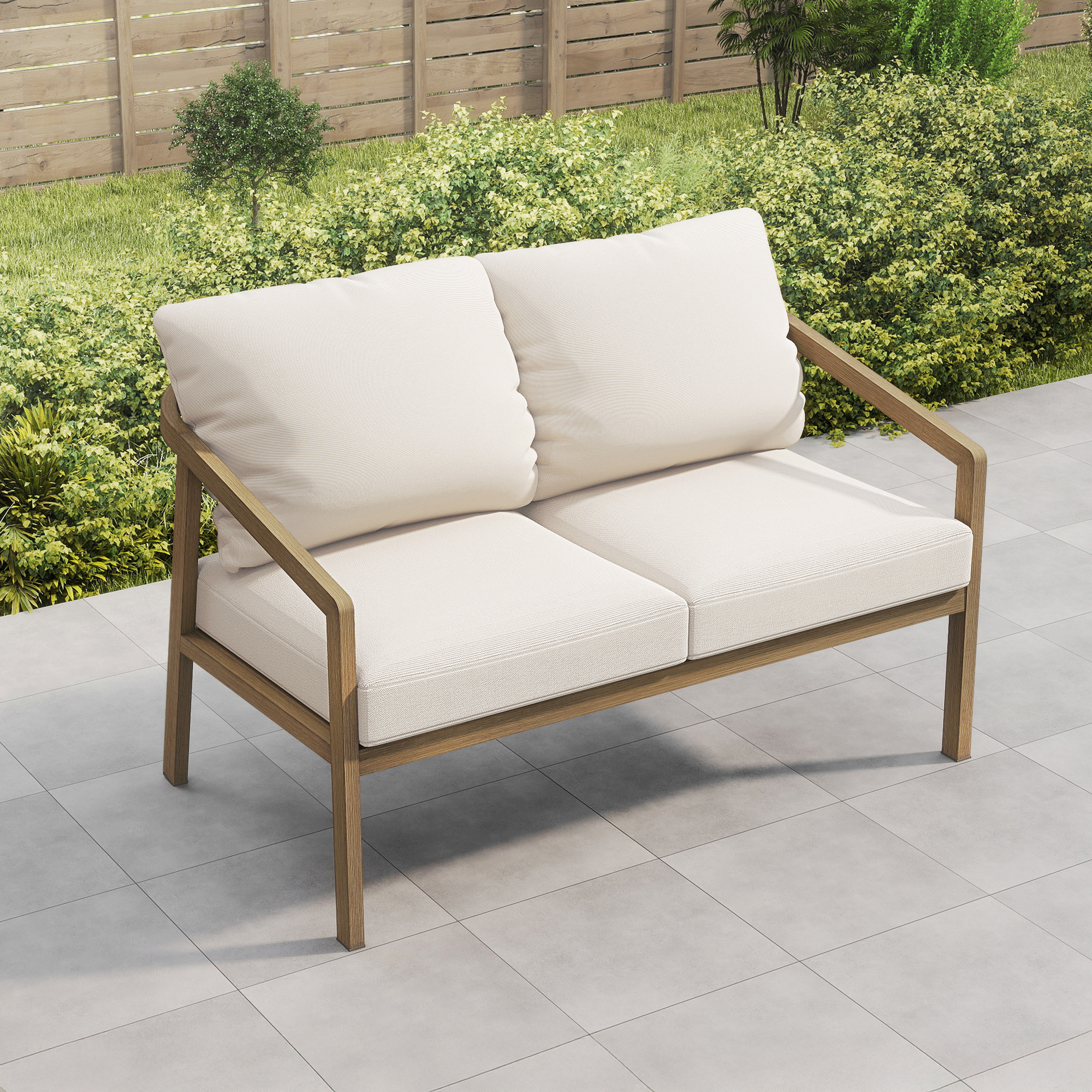 Stone Outdoor loveseat with wooden frame and white cushions on patio tiles near garden-Seehill