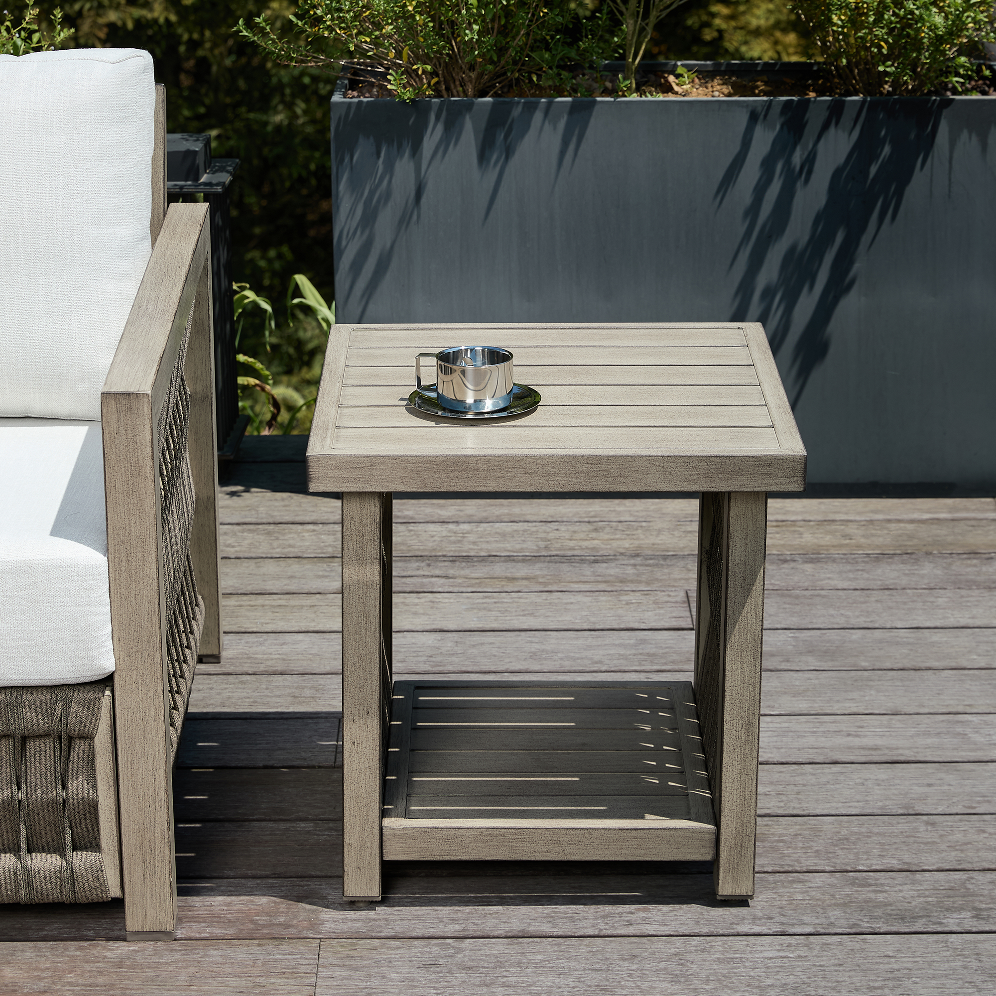 This graceful outdoor patio side table with aluminum frame, tiered rope weave design, and adjustable legs enhances any outdoor space. - Seehill