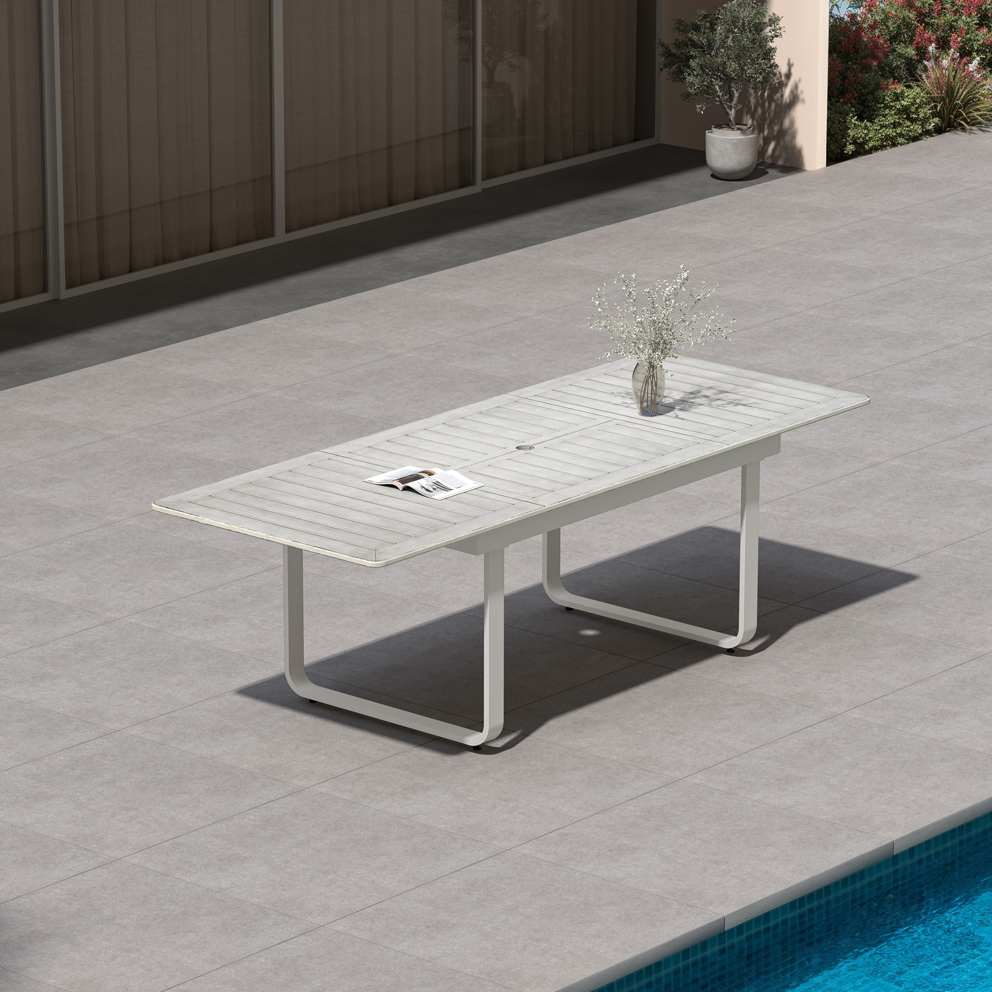 Expandable outdoor dining table with U-shaped legs on patio near pool -Seehill