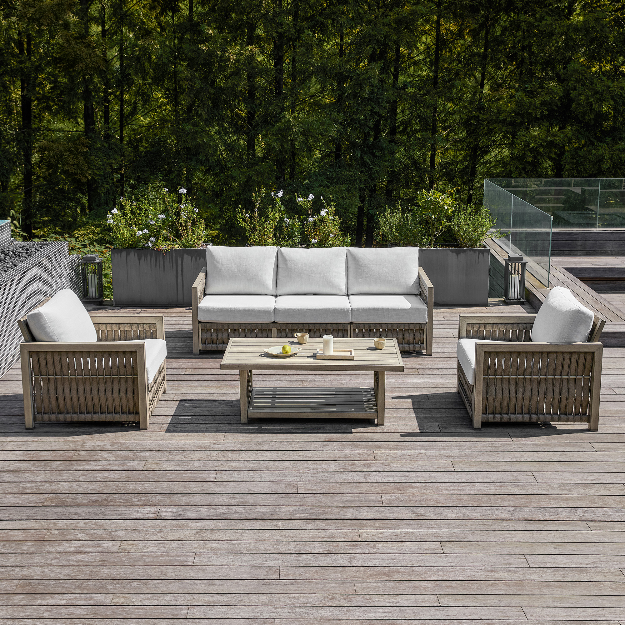 Experience the modern outdoor patio set with a wooden frame and white cushions in our sophisticated outdoor collection. - Seehill
