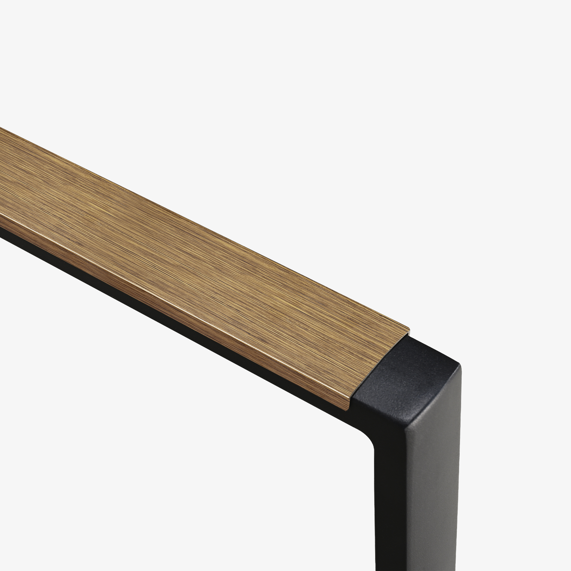 Close-up of the extendable outdoor dining table corner with wood grain and black metal frame-Seehill