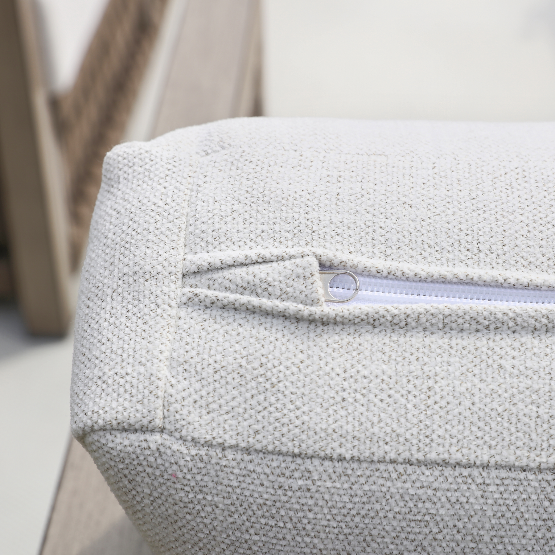 Beige textured ottoman with hidden zipper closure detail - Seehill