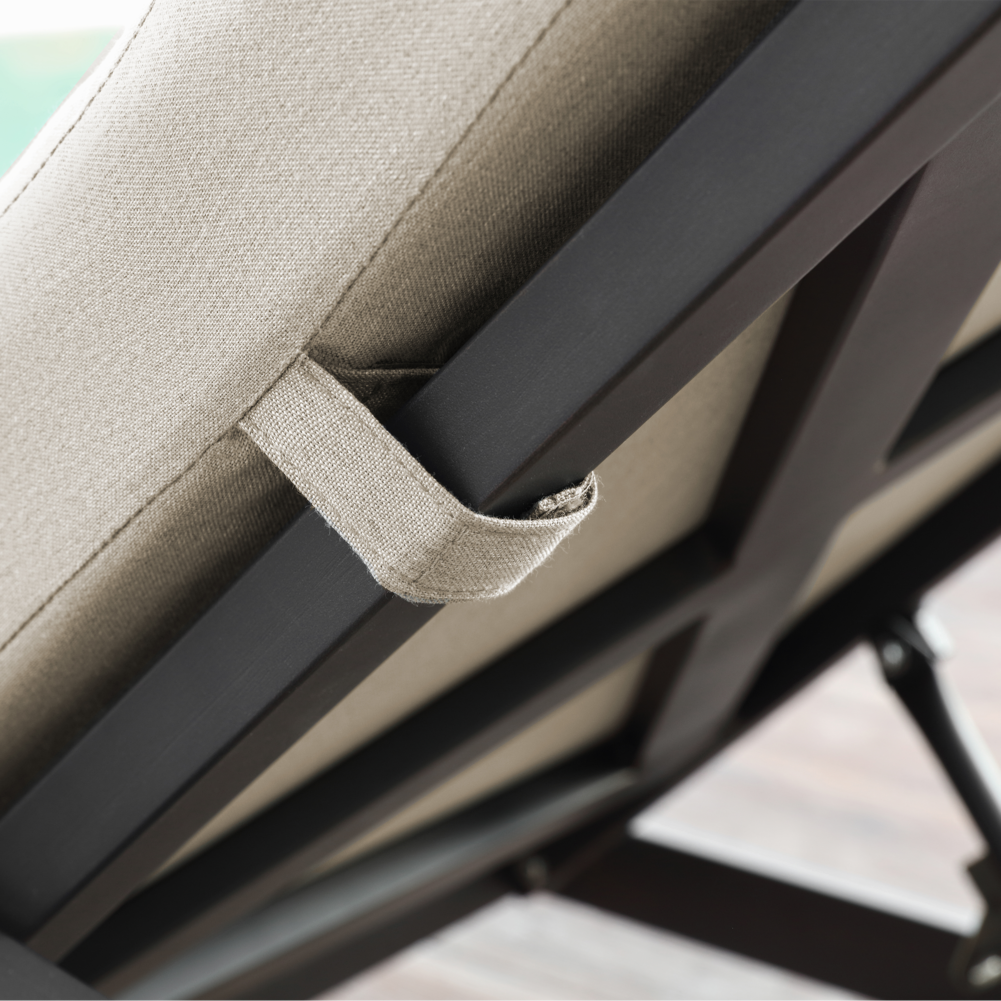 Close-up of adjustable backrest mechanism and fabric strap on patio outdoor lounge-Seehill