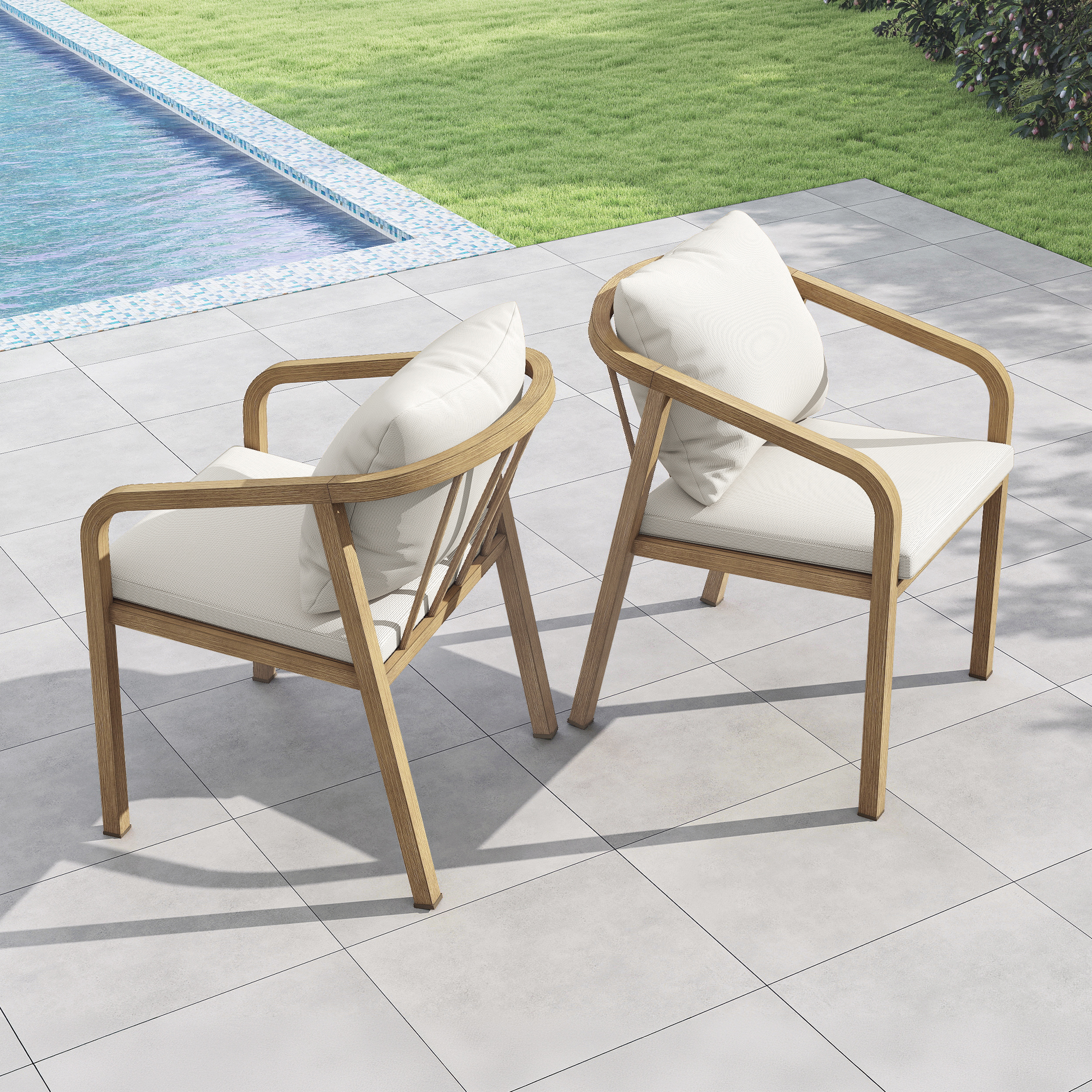 Two cushioned outdoor dining chairs with wooden wraparound frames by a poolside patio-Seehill