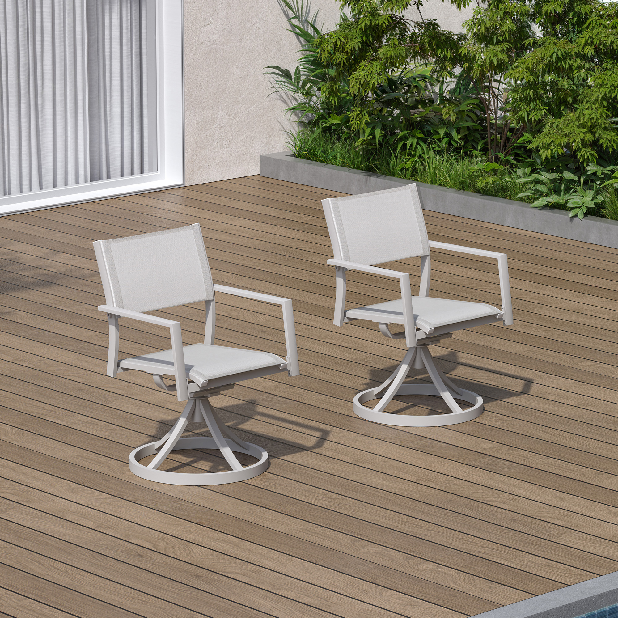 Two white stackable swivel patio dining chairs on wooden deck near pool-Seehill
