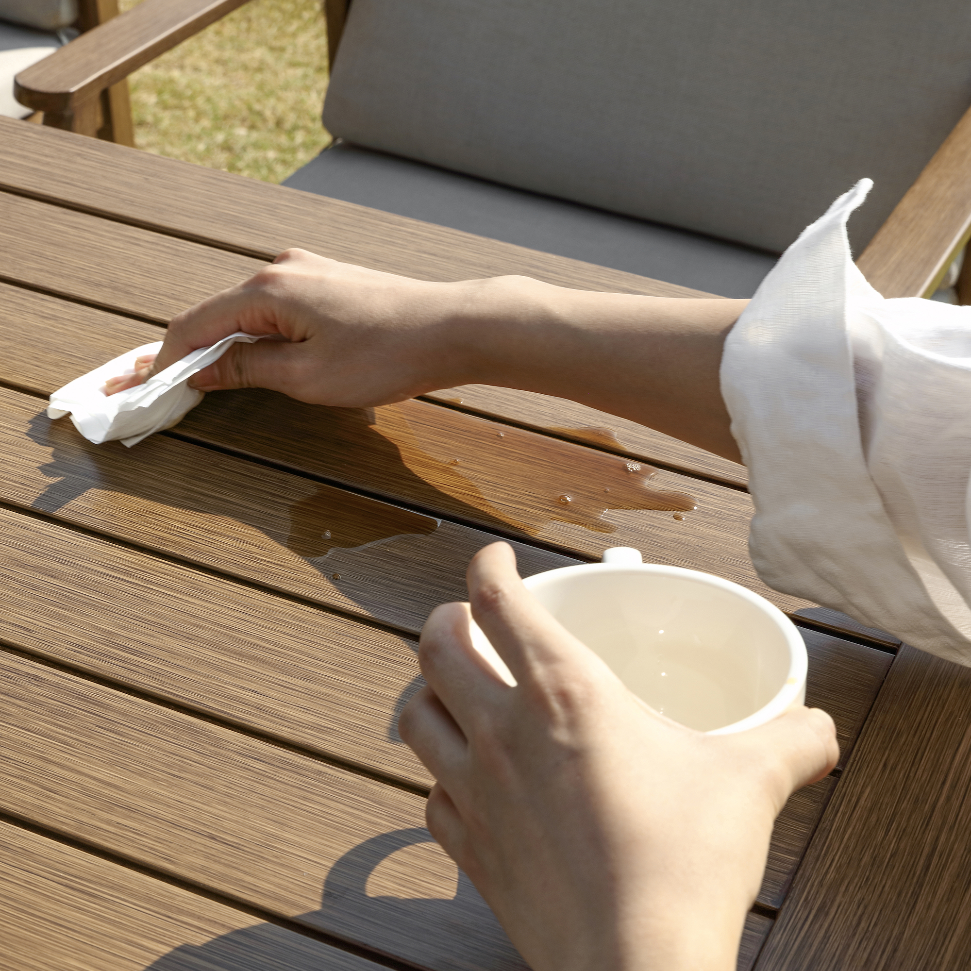 Experience the waterproof outdoor deck table with an easy-to-clean surface in our opulent outdoor collection. - Seehill