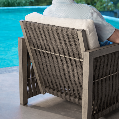 Outdoor wicker armchair with cushion, poolside seating - Seehill