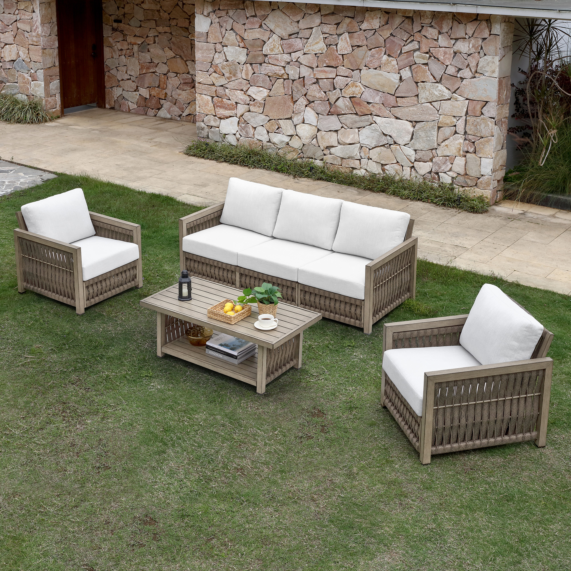 Crafted with weather-resistant woven rattan and white cushions, this outdoor patio conversation set is designed for longevity. - Seehill