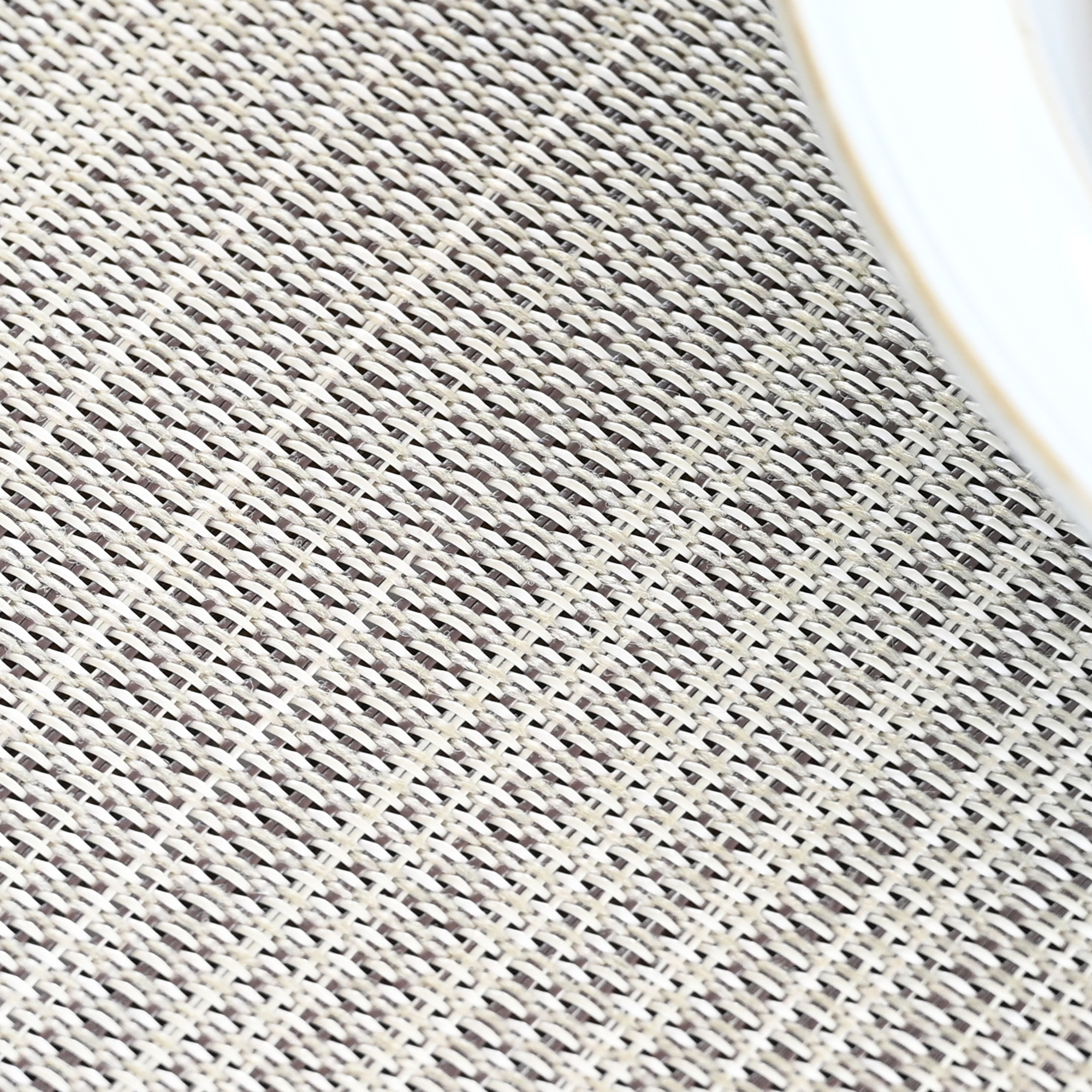 This exclusive set of versatile clean look placemats features four gray, woven rectangular placemats. - Seehill