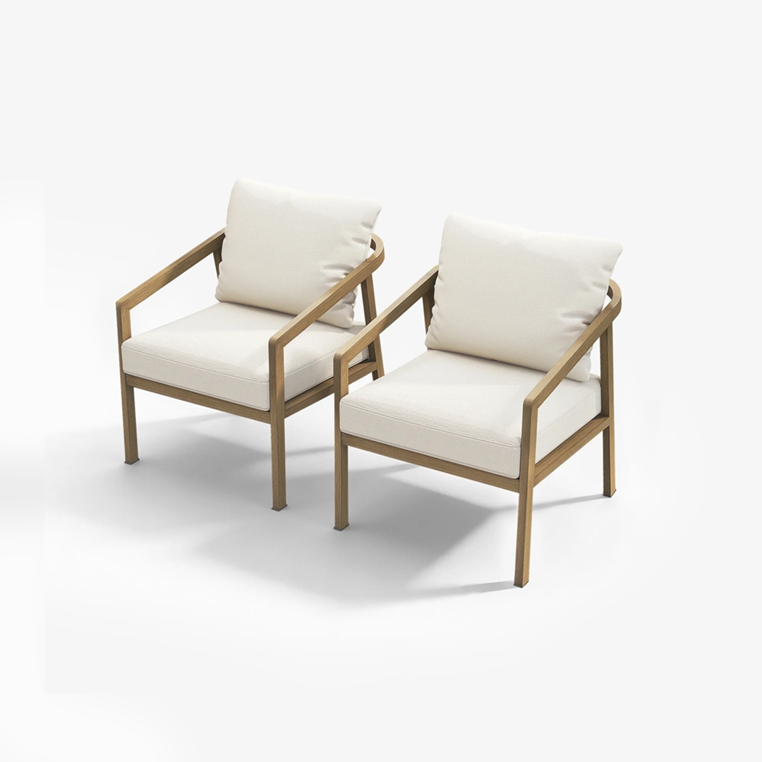 Experience the two beige cushioned armchairs with dark metal frames set on a wooden deck, providing a modern seating option. - Seehill