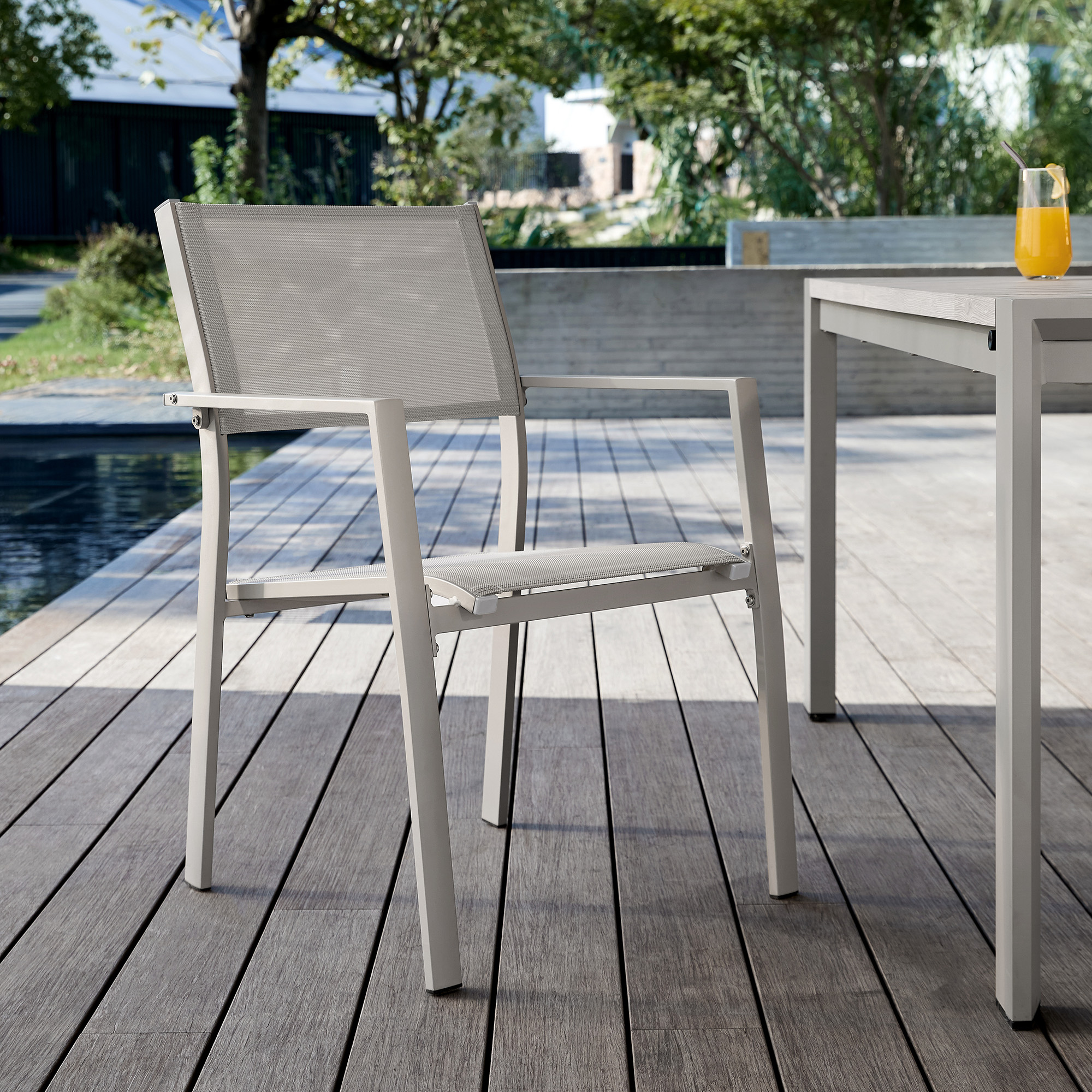 Modern outdoor chair with mesh back and armrests, gray metal frame - Seehill